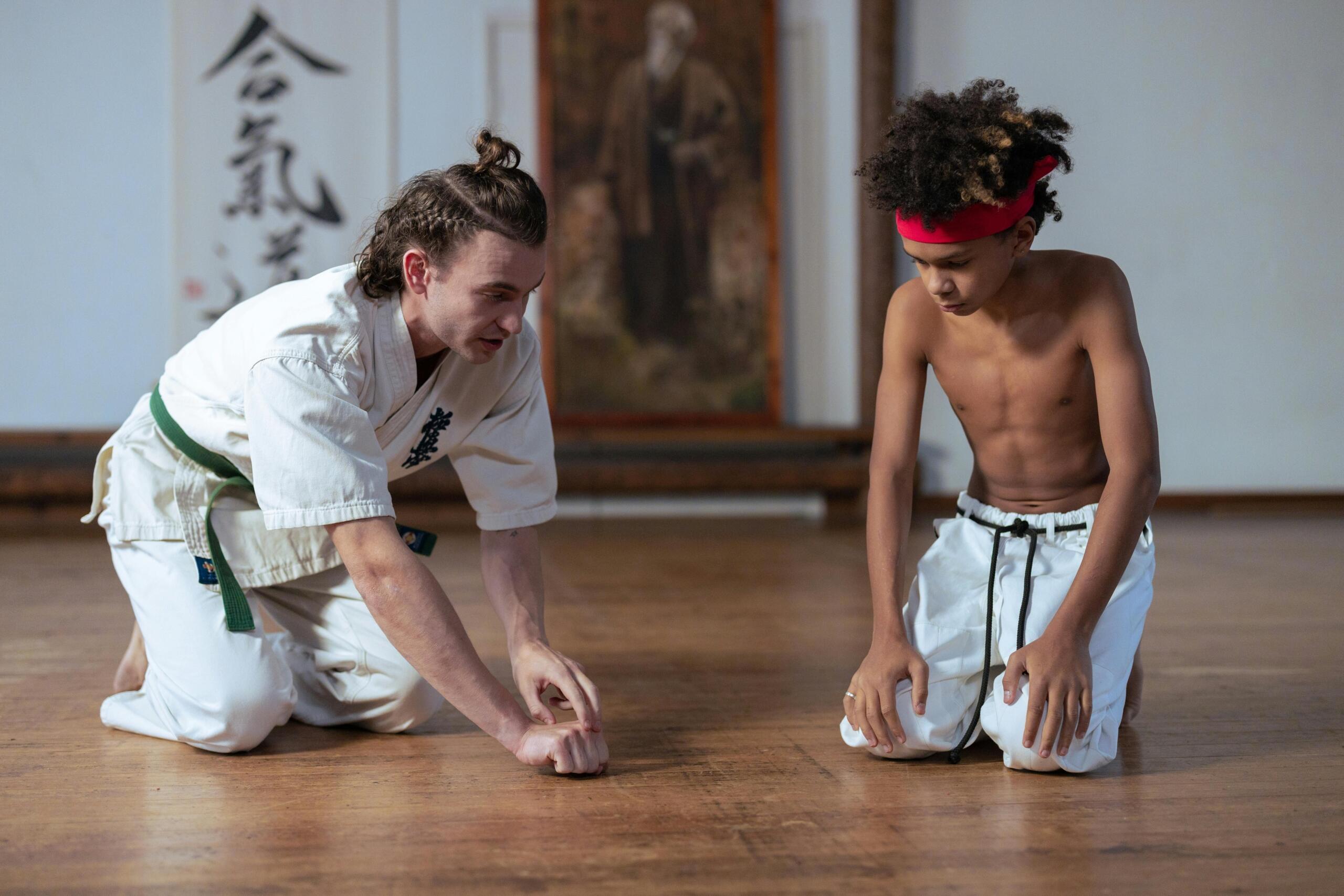 Karate teacher and student