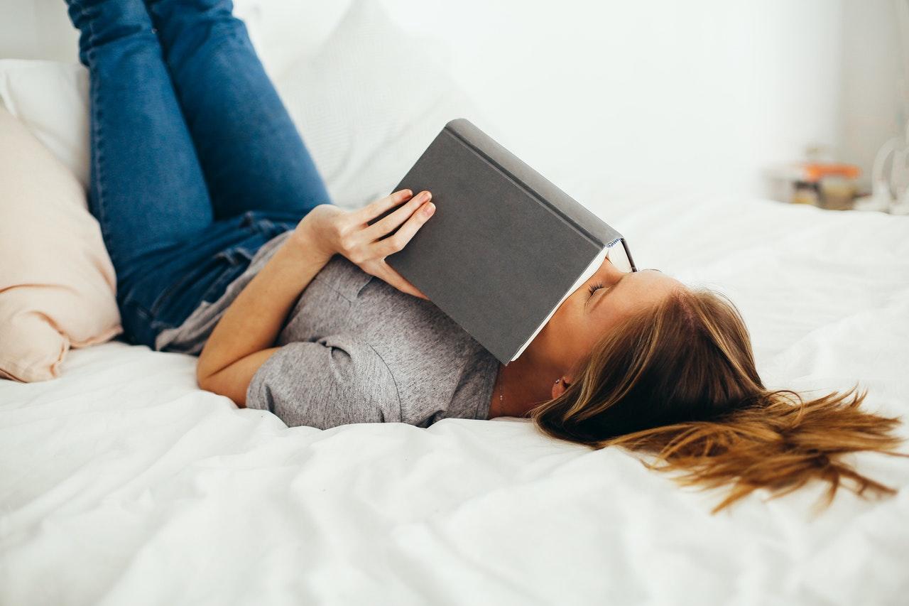 reading a novel on bed
