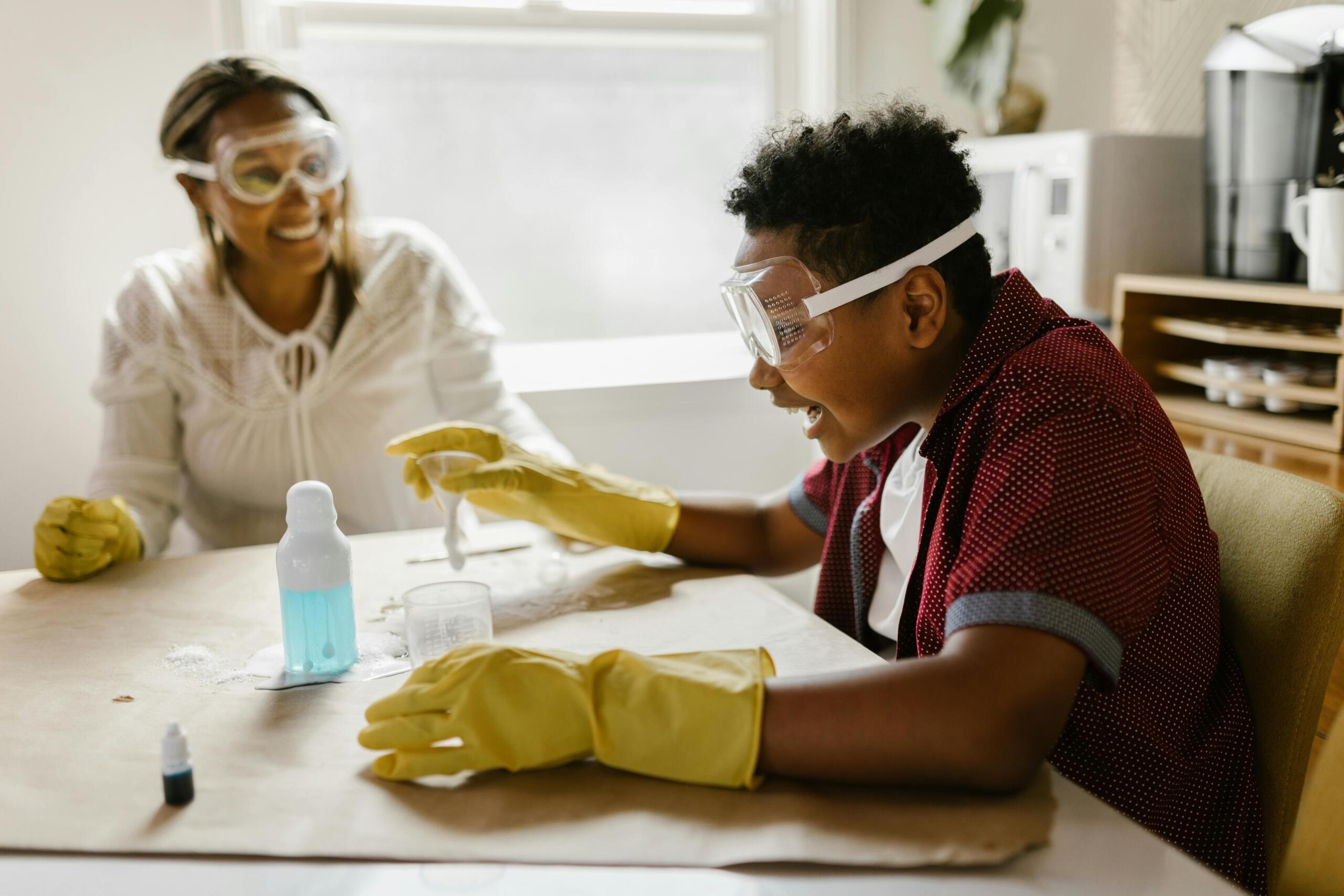 A boy excitedly conducting a science experiment