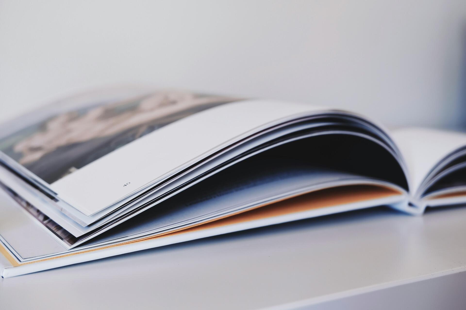 An open book placed on a white desk symbolising accounting and finance studies in Malaysia.