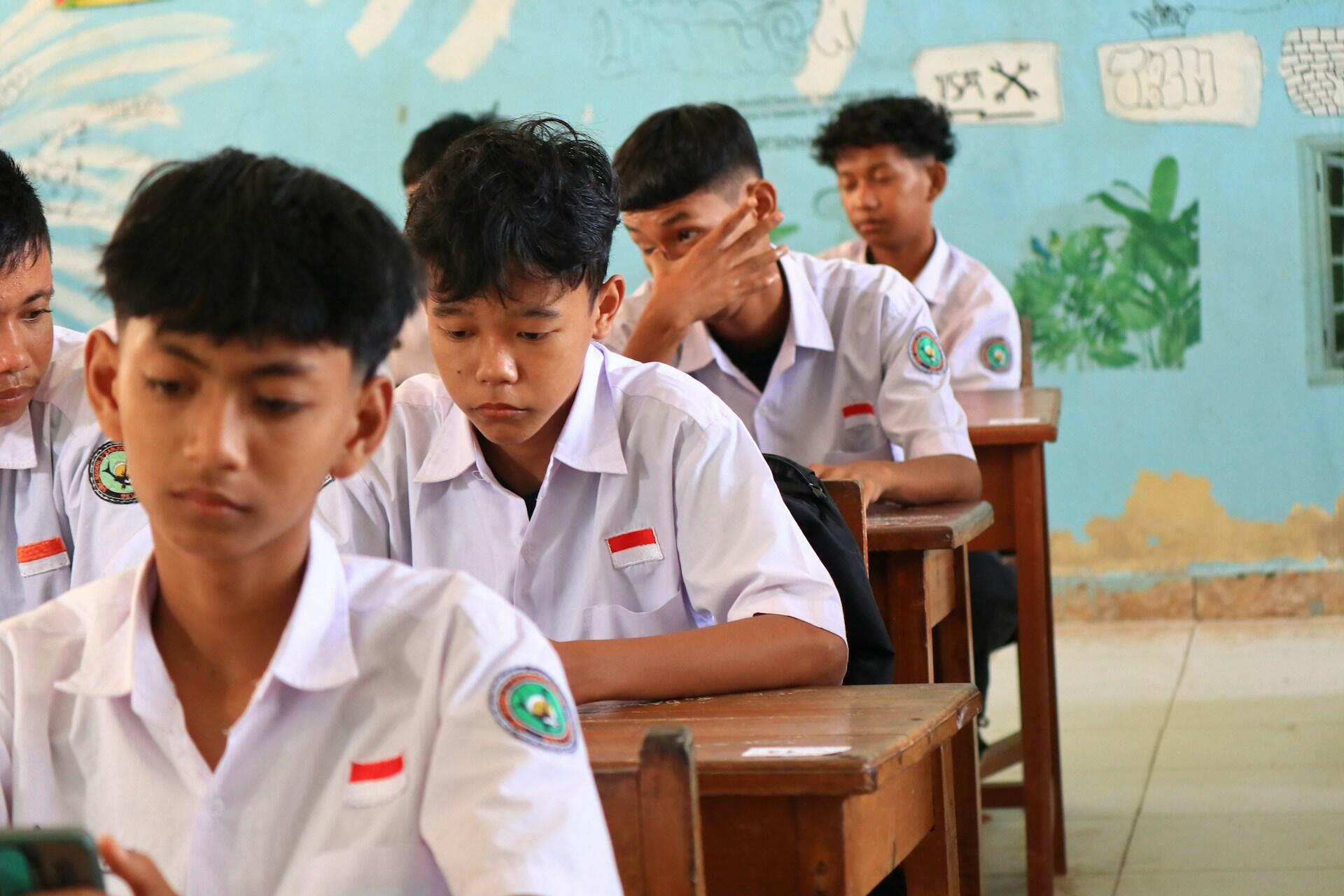 Malaysian students sitting in a classroom