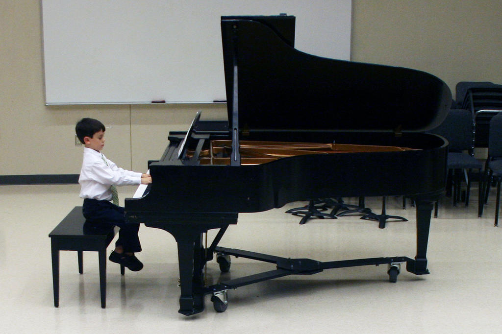 A young pianist performing