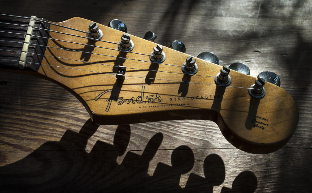 The top end of the guitar holds all the mechanics.