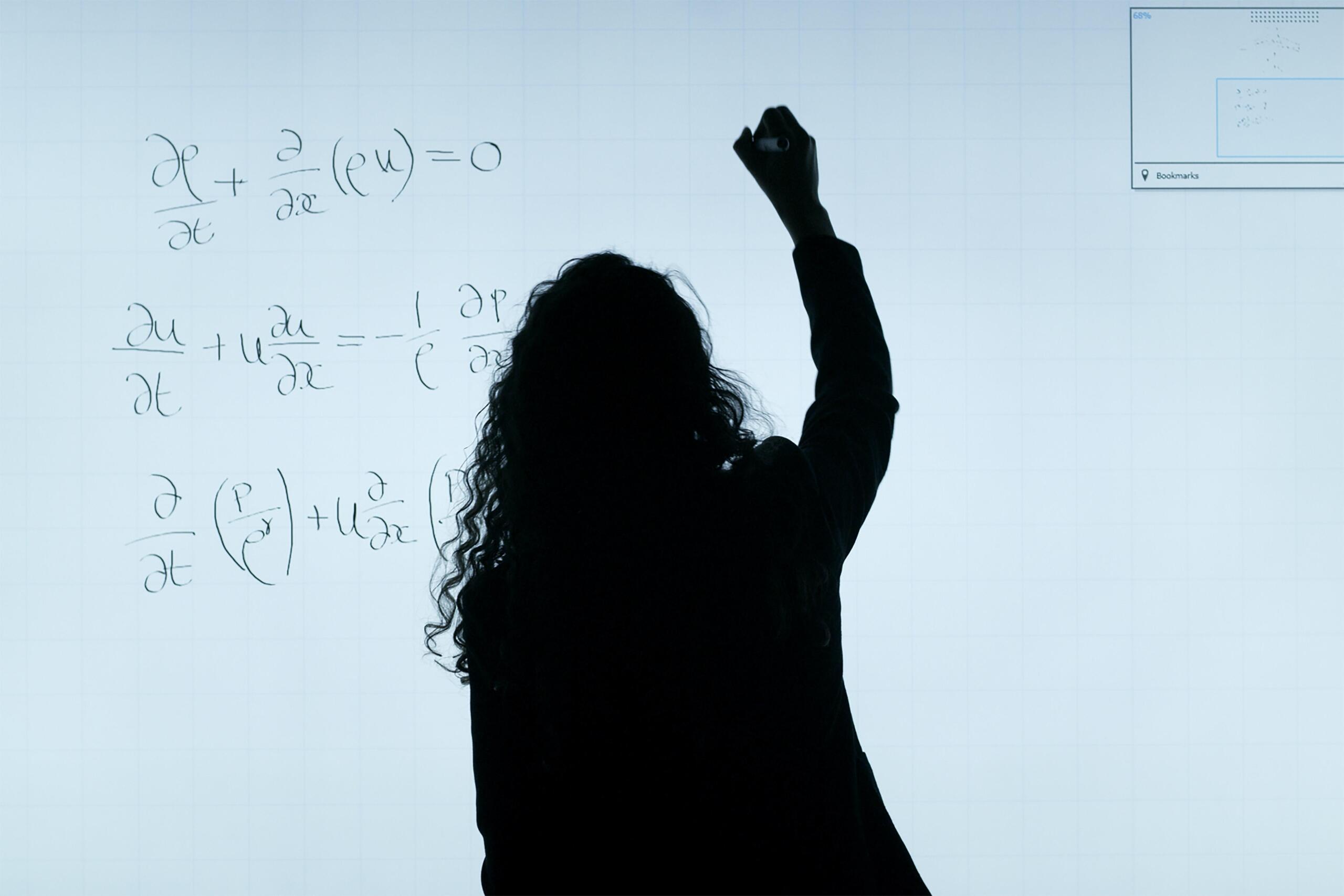 Teacher using whiteboard