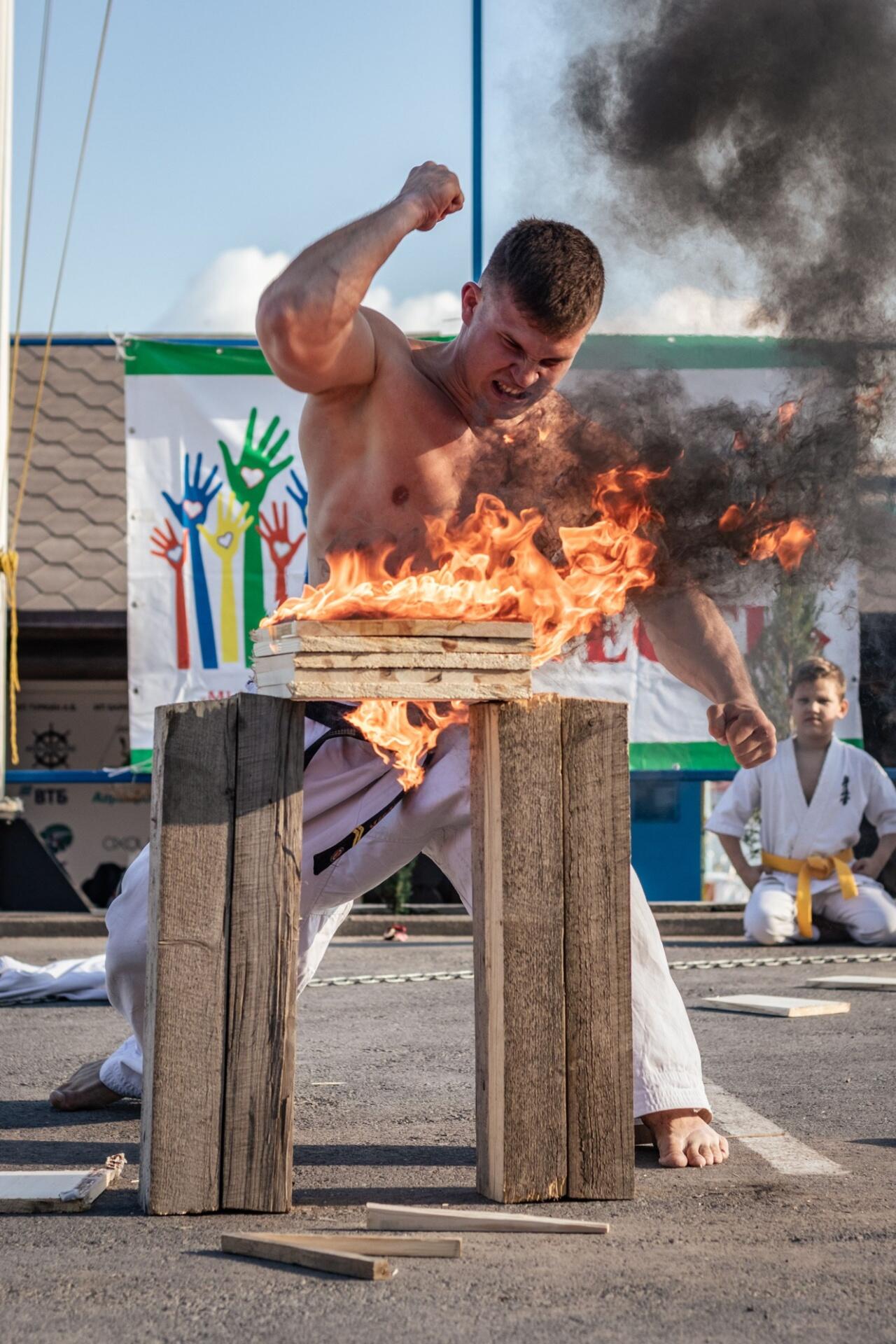 Martial artist practicing with focus, demonstrating discipline and controlled technique