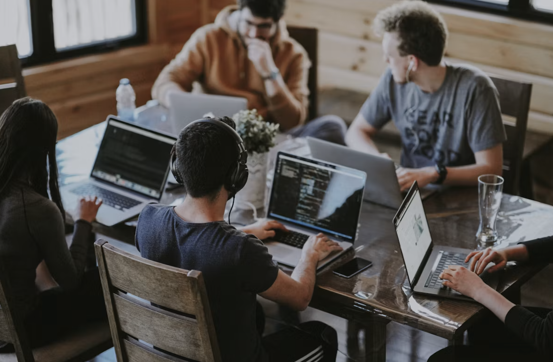 A group of students sitting at a desk