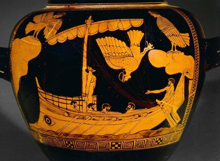 Ancient vase featuring intricate designs of a bird and a boat, showcasing historical craftsmanship and artistry.