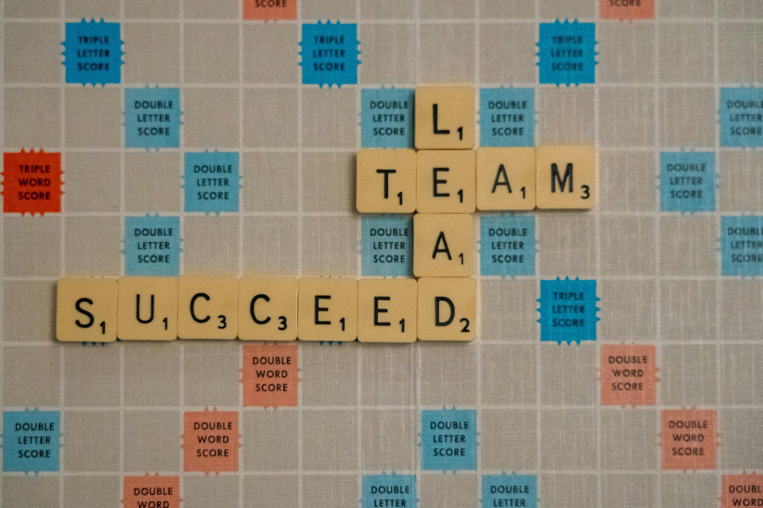 Close-up of Scrabble tiles forming the phrase 