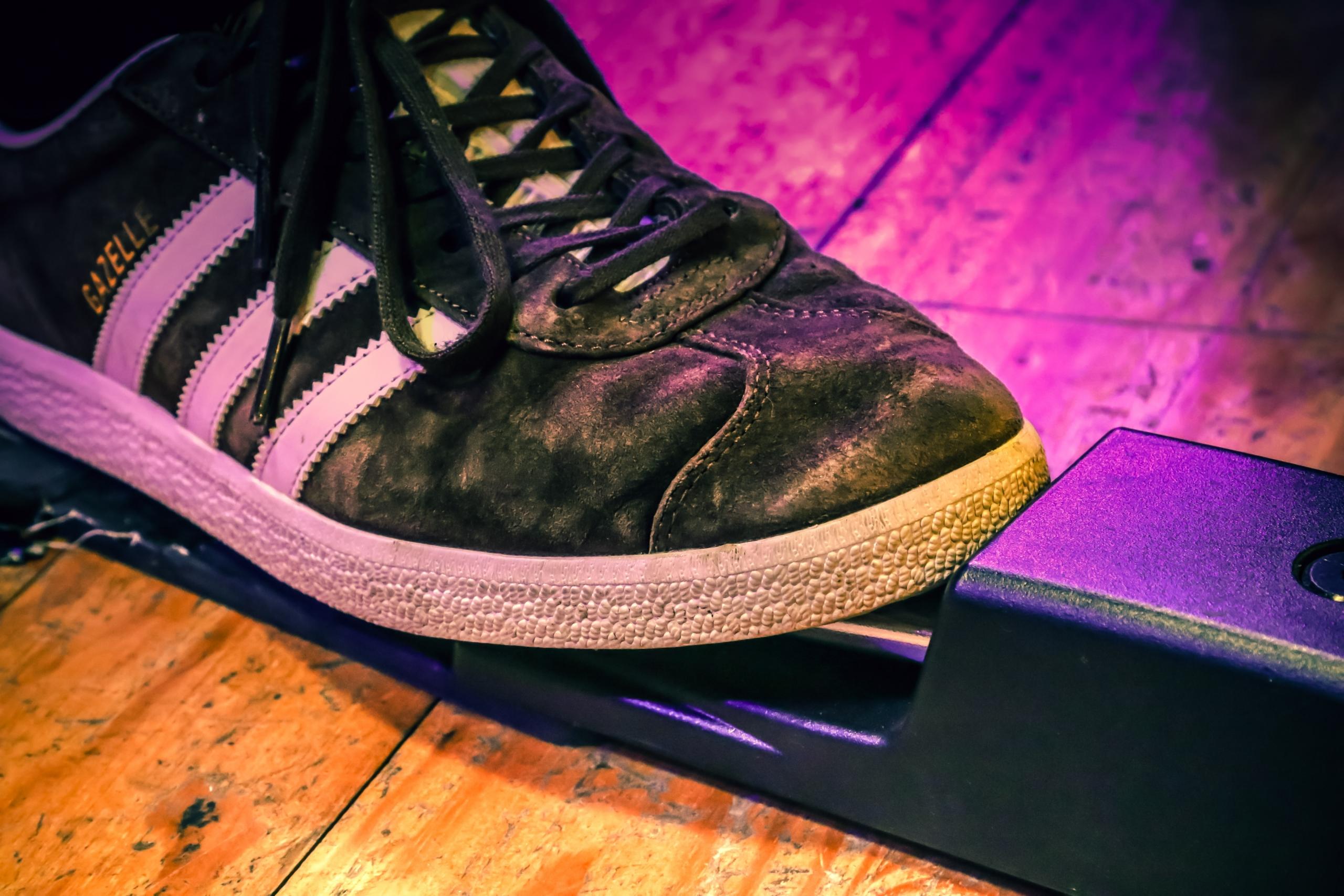 Foot on a piano pedal