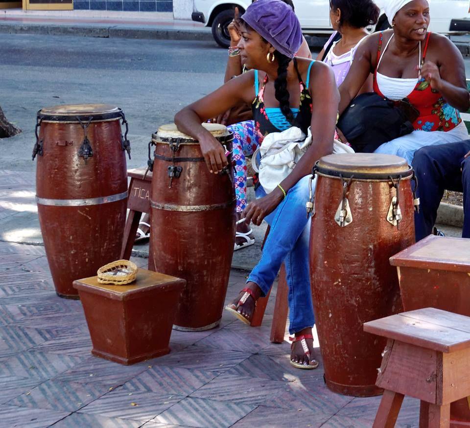 Drummers learning to Play the Conga Drum