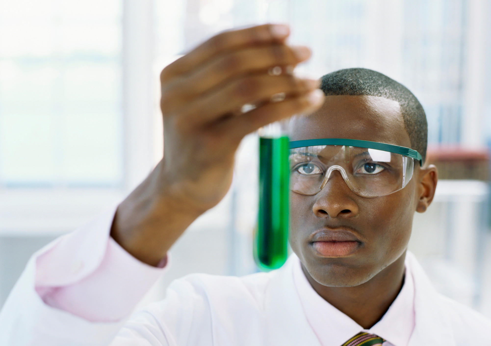 Black Scientist testing a Chemical