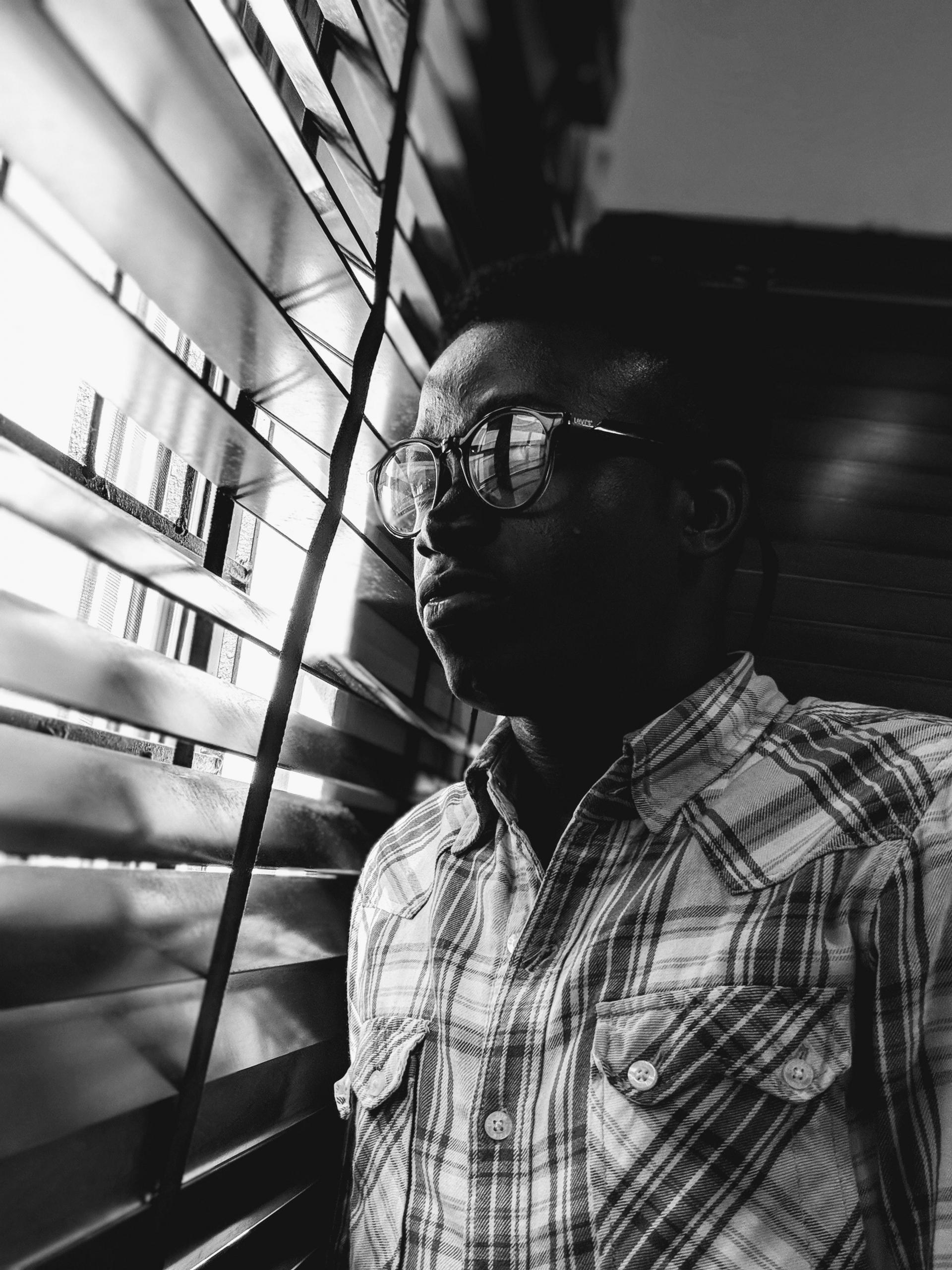A scholar looking out the window.