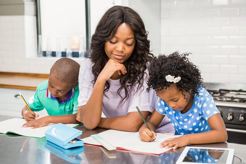 A private tutor teaching some kids