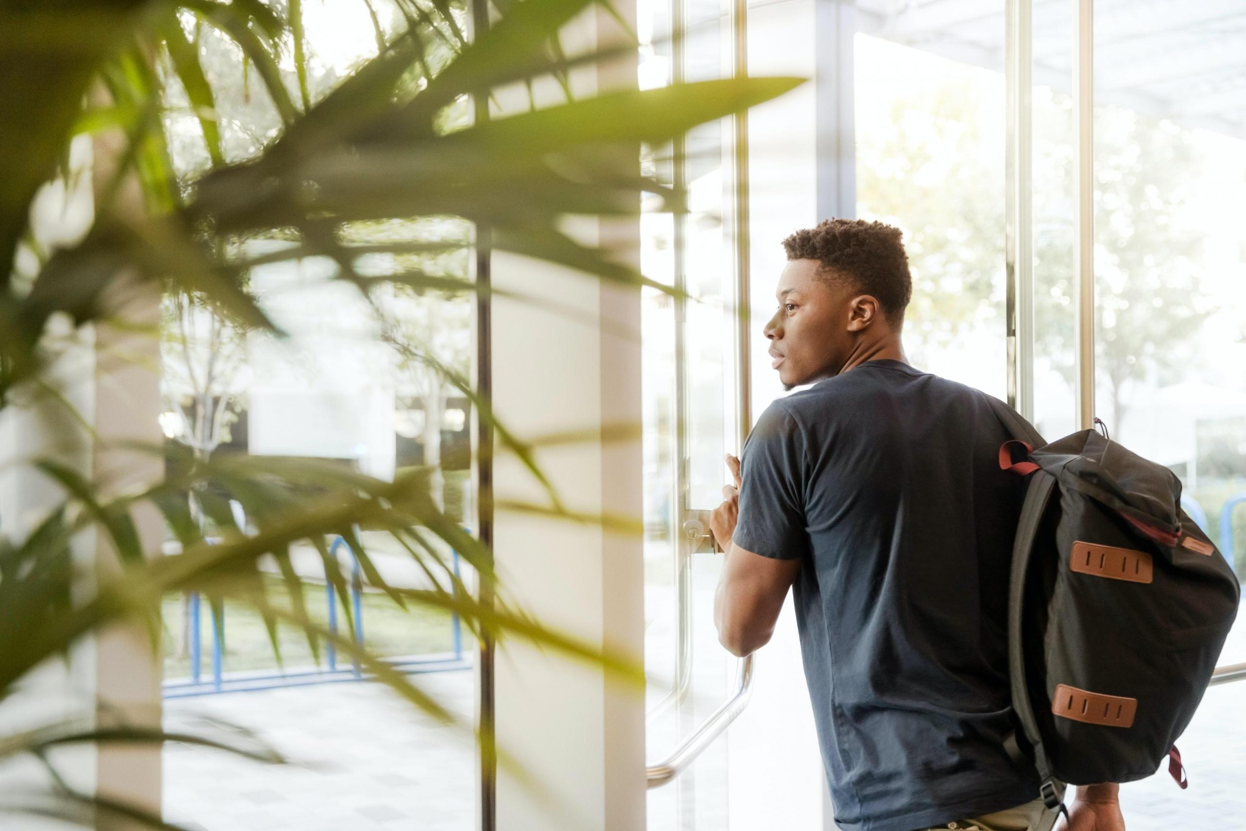A young man with a backpack 