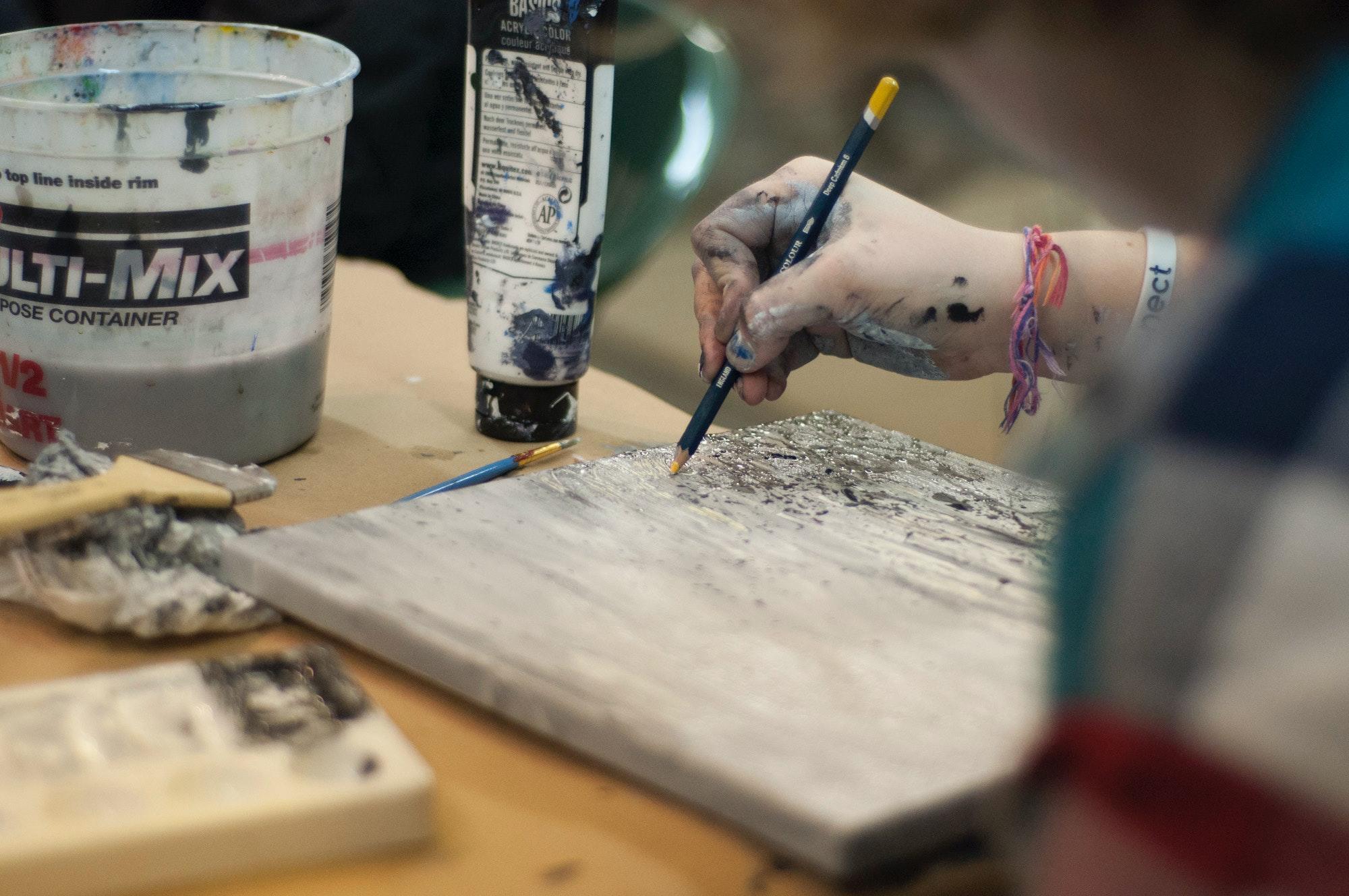 Someone making a painting