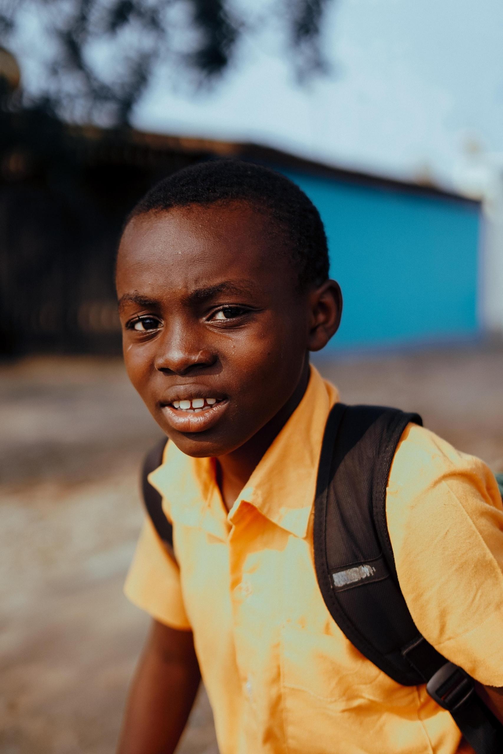 Boy returning home from school
