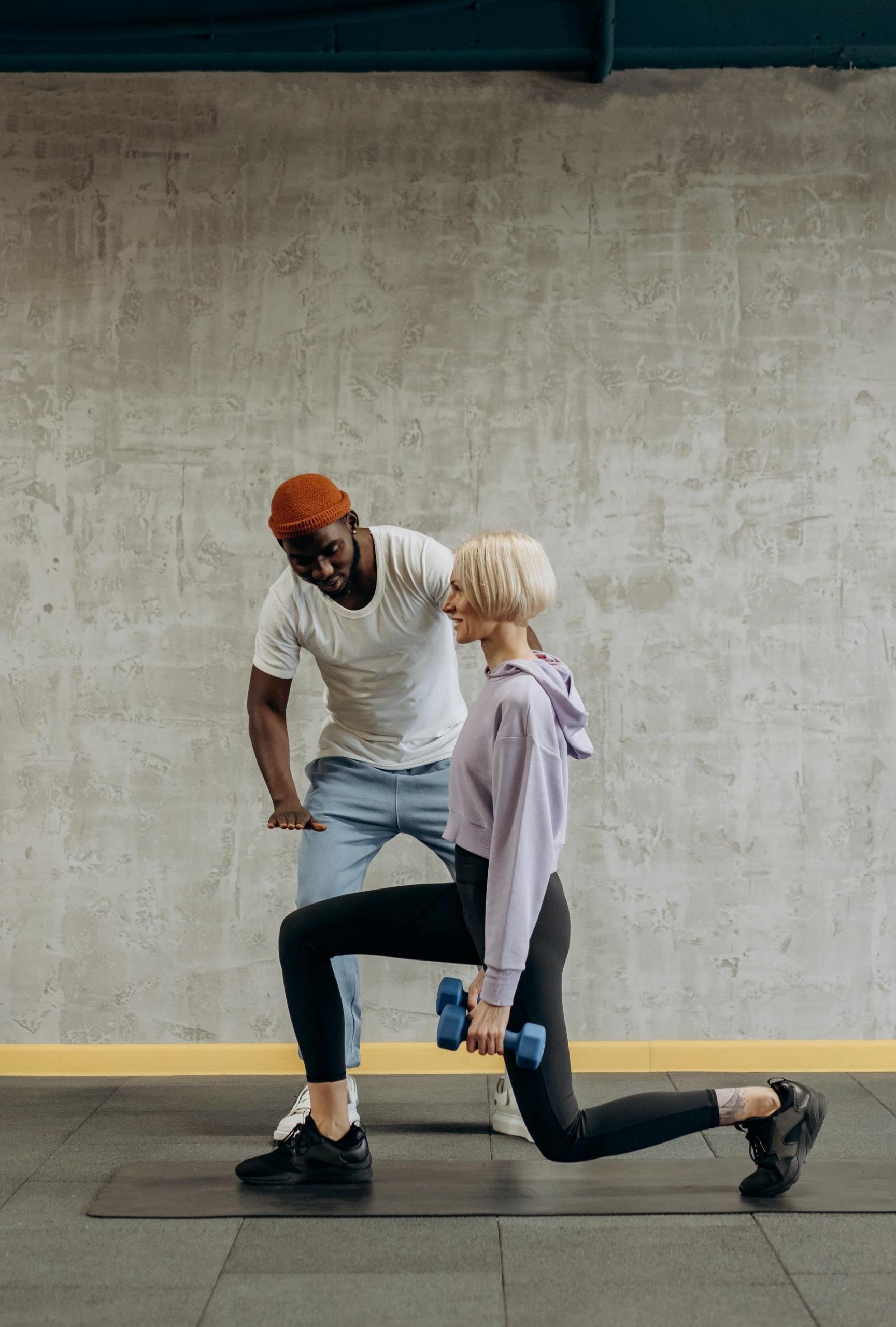 A woman exercising with dumbell