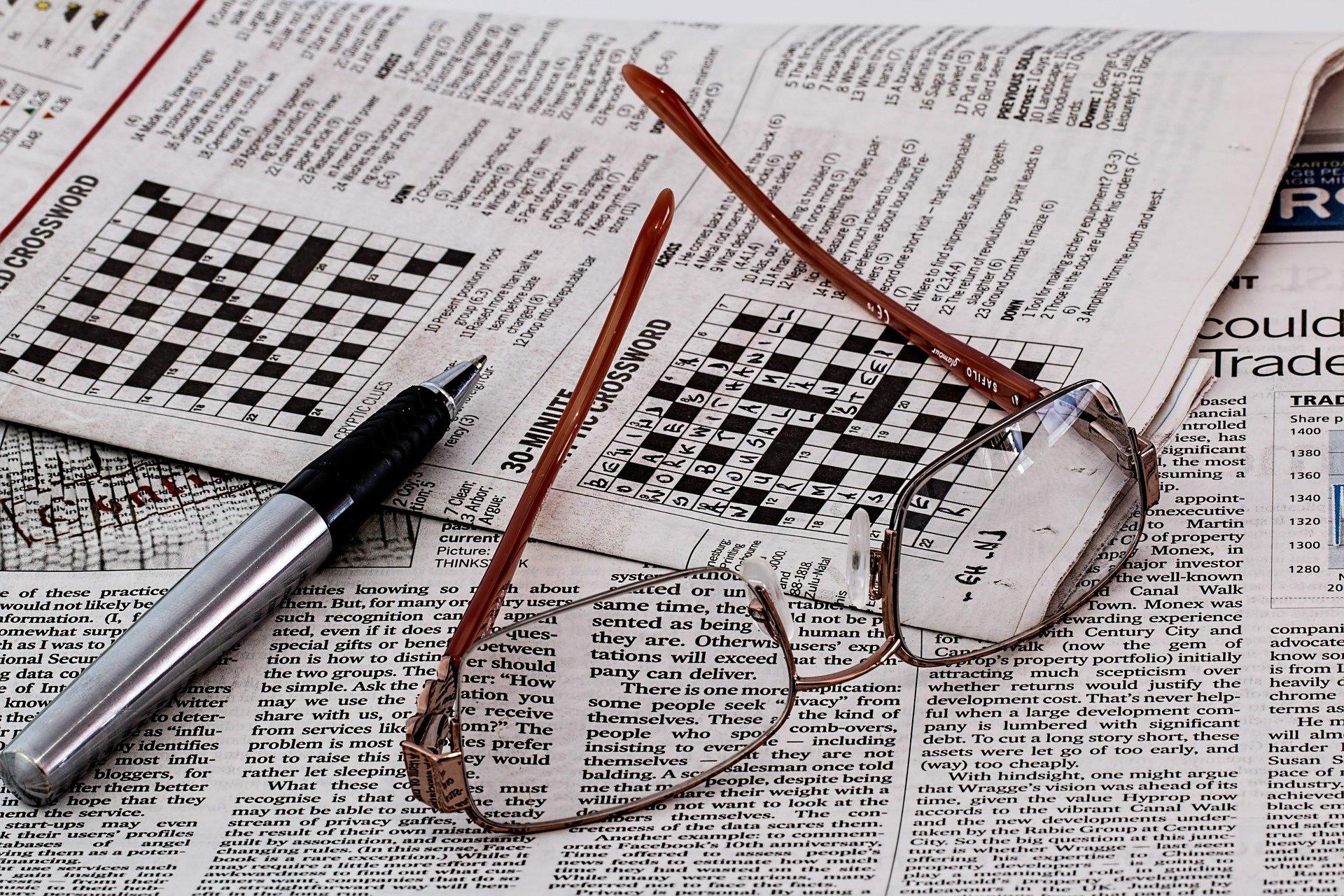 A newspaper page showing crossword puzzles
