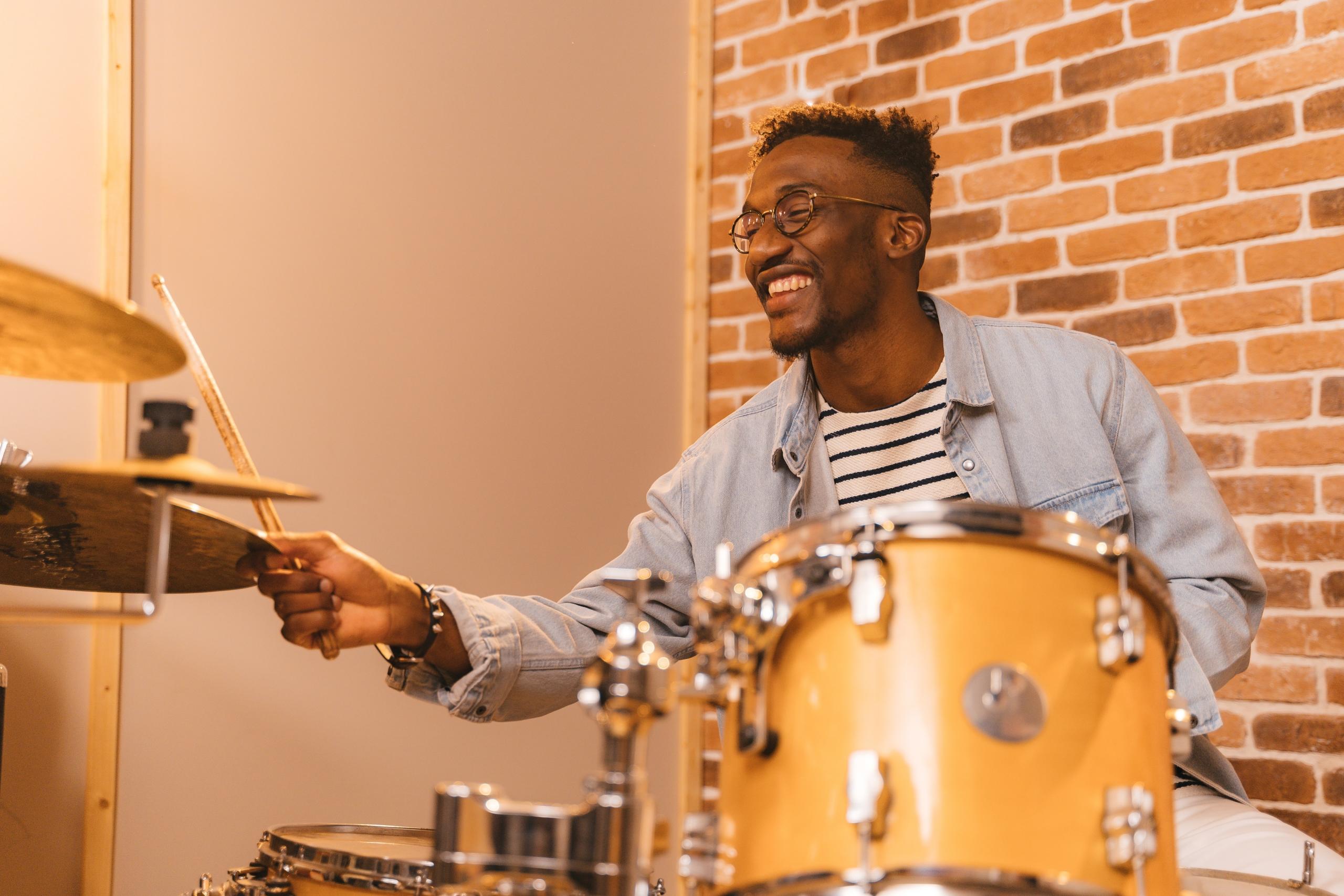 Young man playing the drums