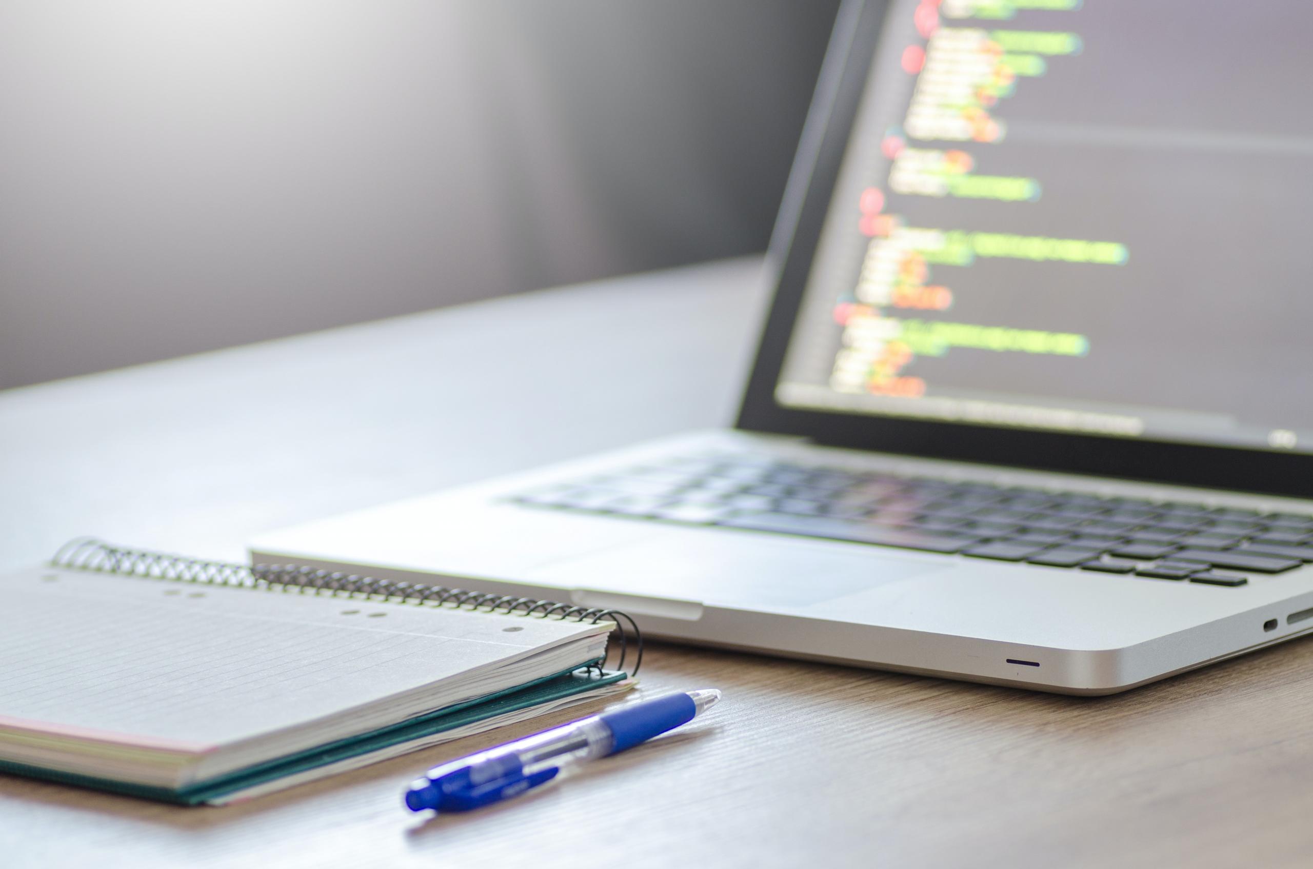 Laptop,notebook and pen