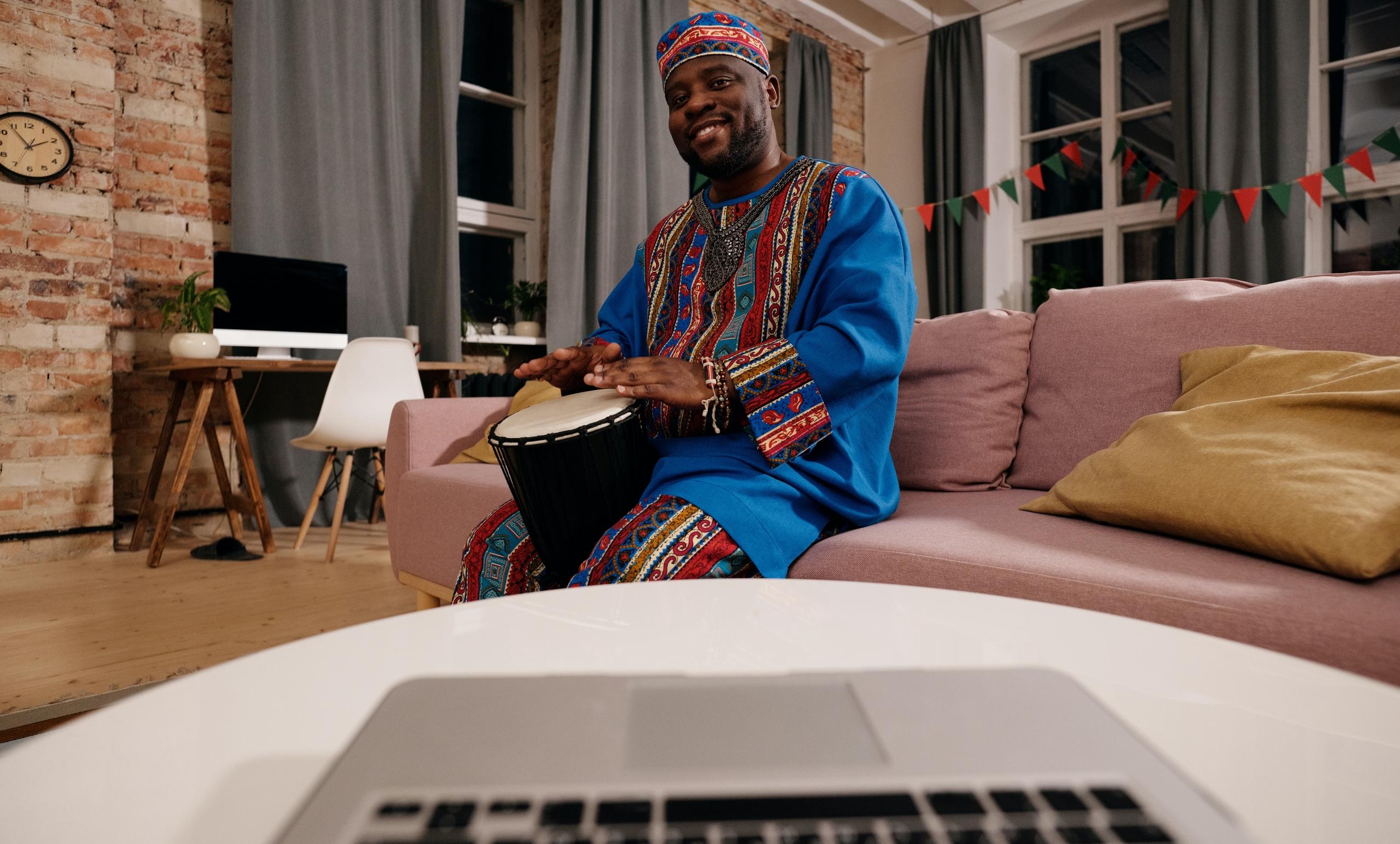 Black man drumming