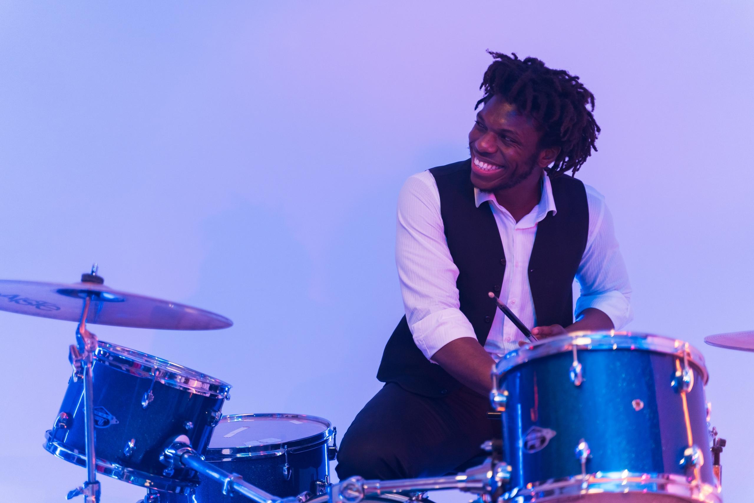Black guy drumming