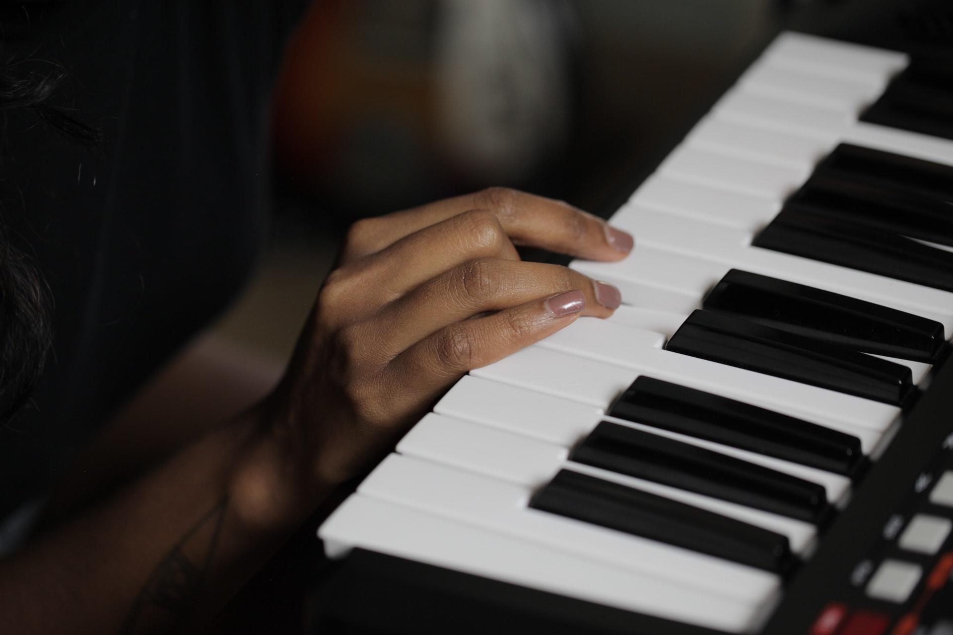 playing the piano as an adult in Nigeria