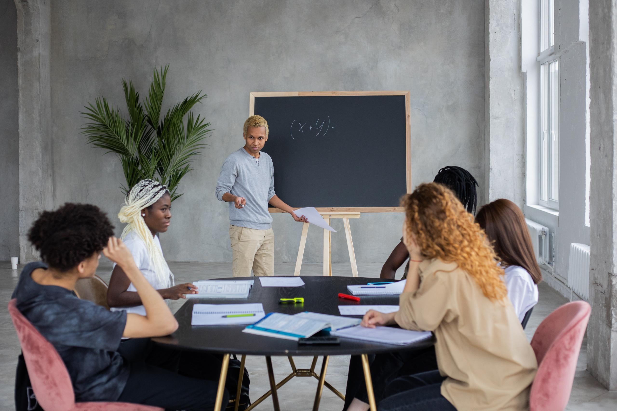 Tutor with a group of student