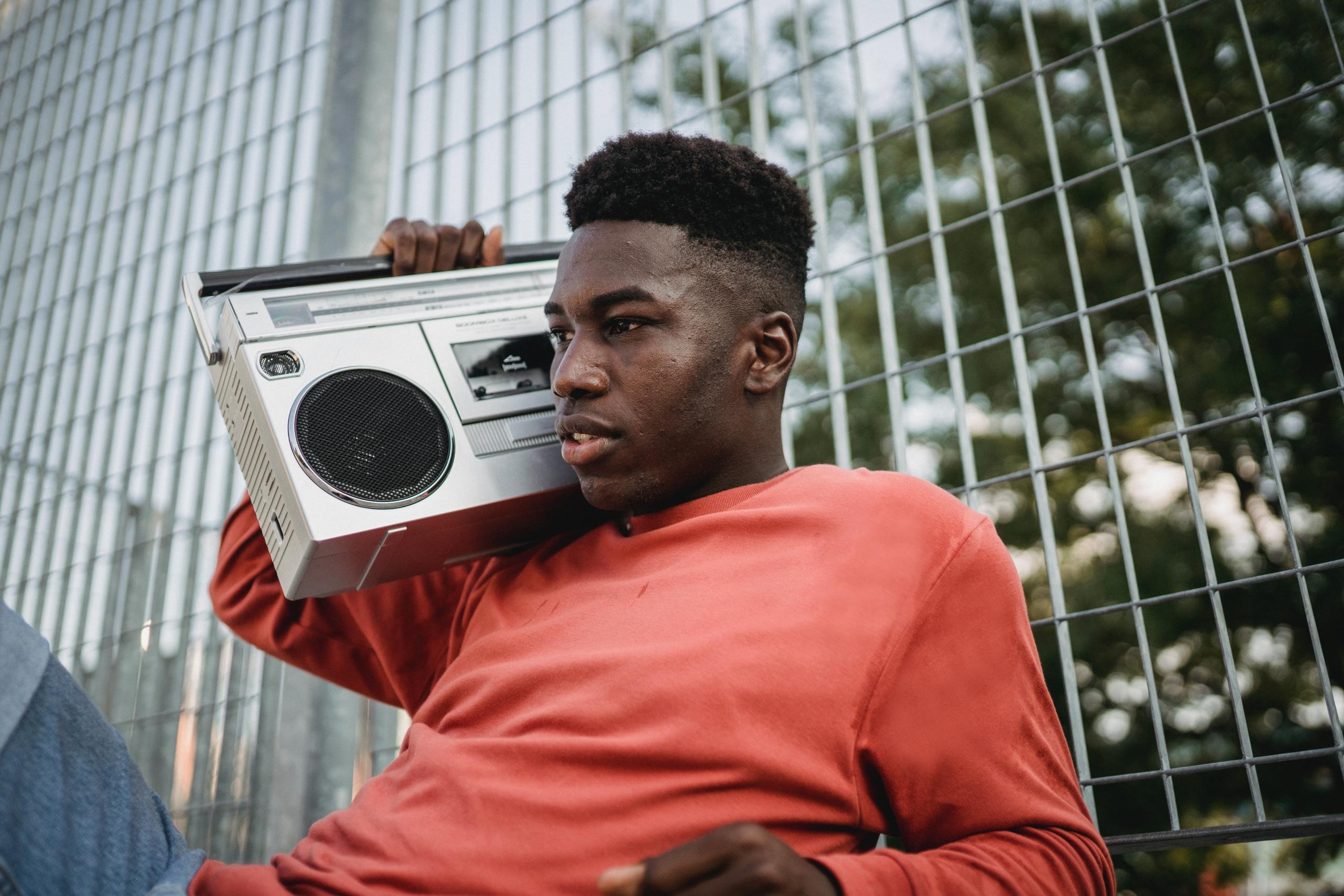 A young man with a radio