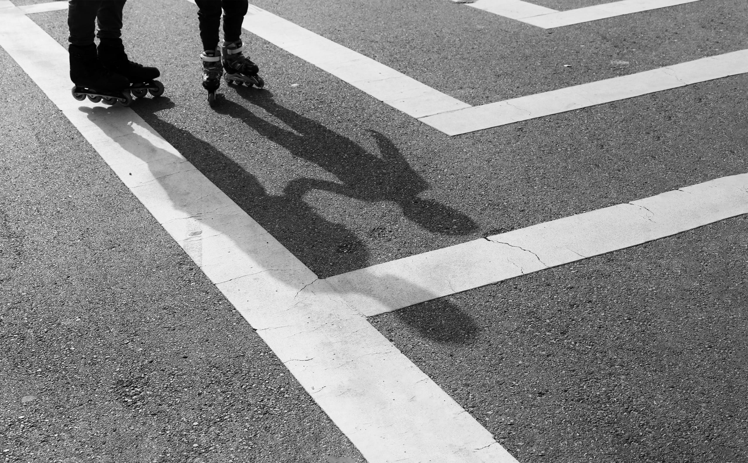 people wearing rollerblades