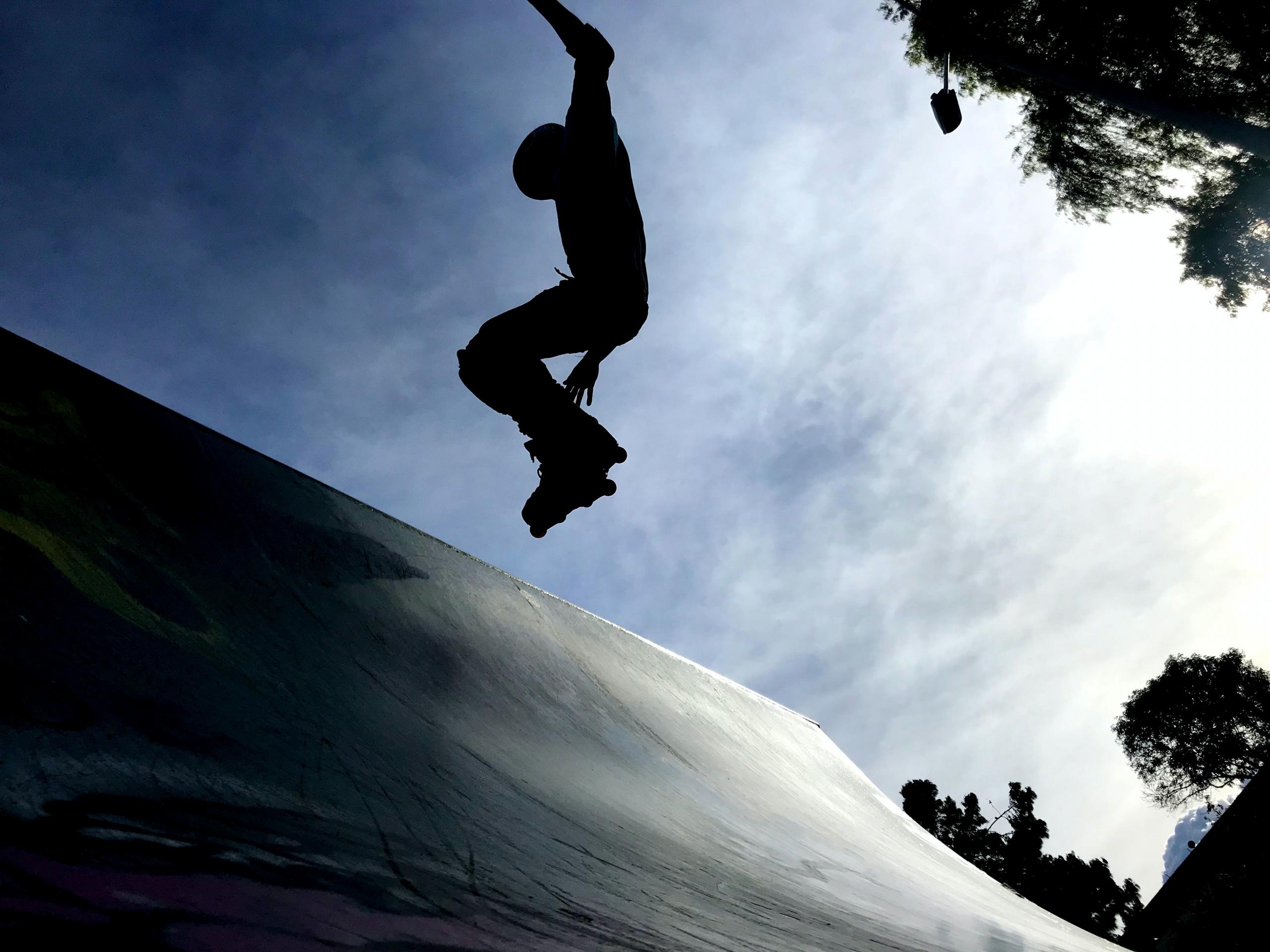 A rollerskater jumping high