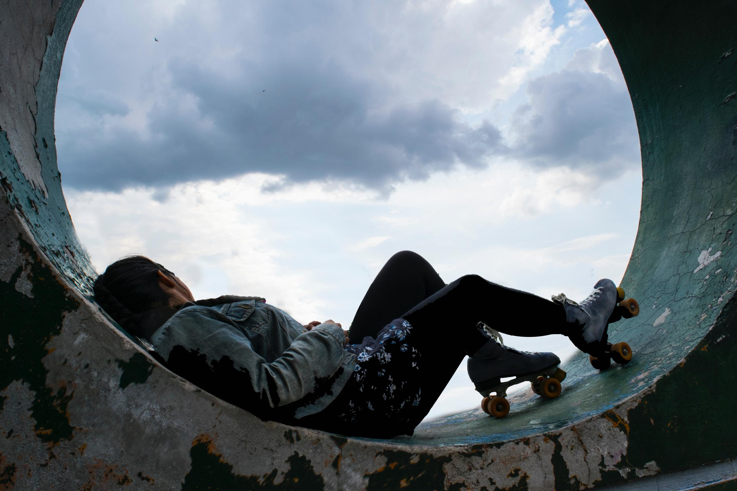A lady relaxing with rollerskates