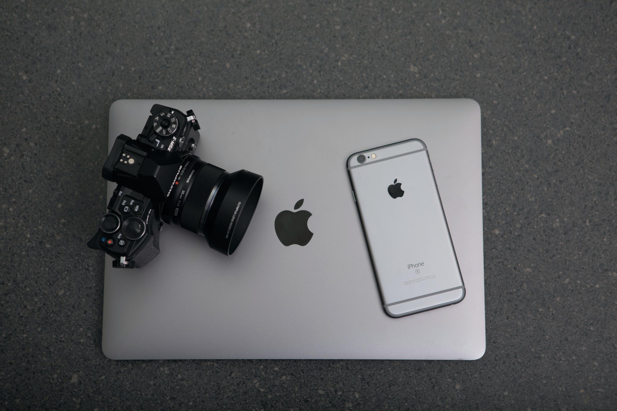 A camera, laptop, and phone