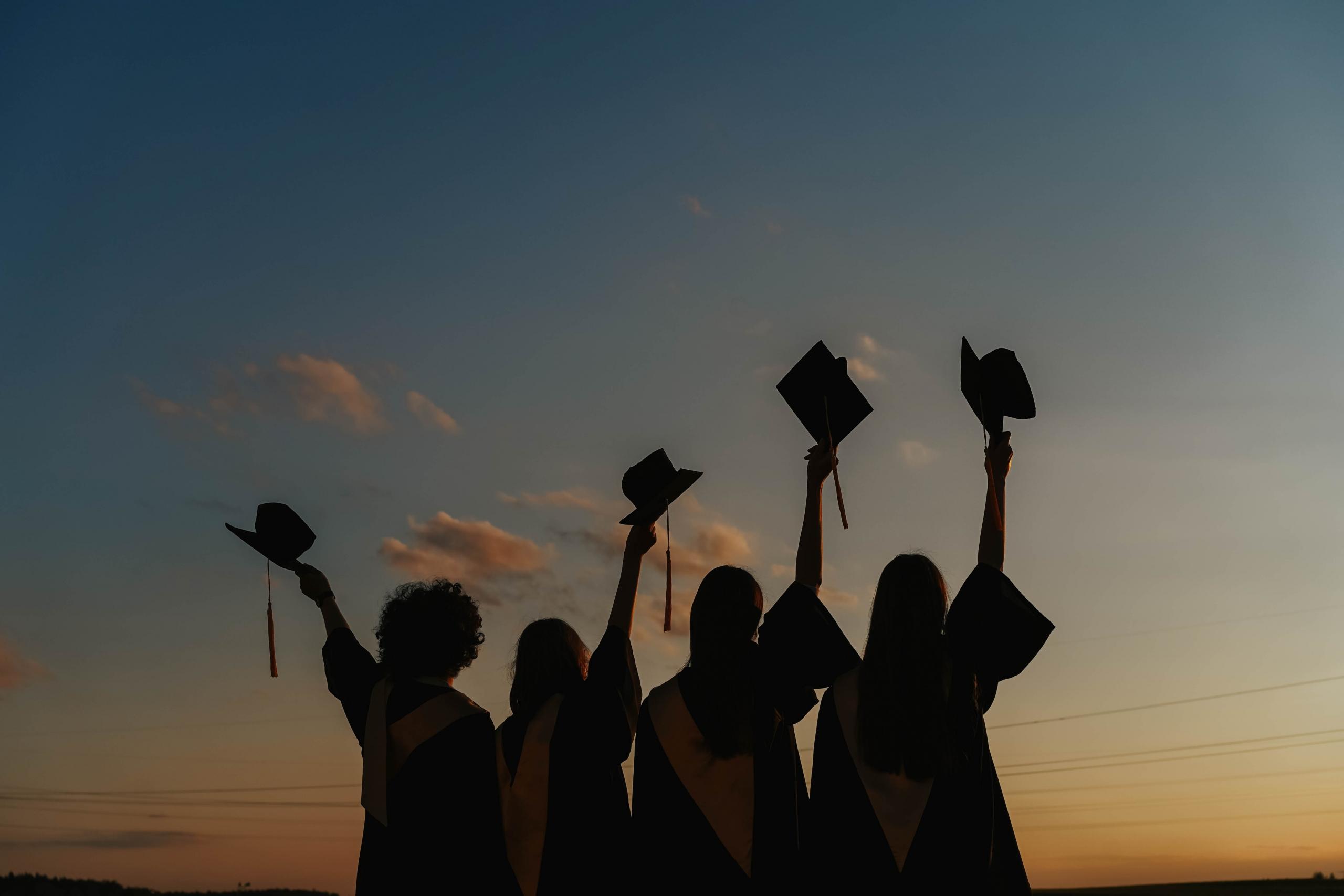 Graduating students silhouette