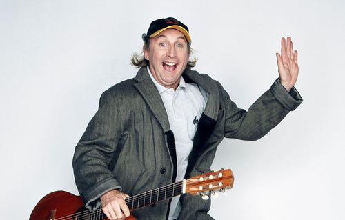 A happy man with a guitar
