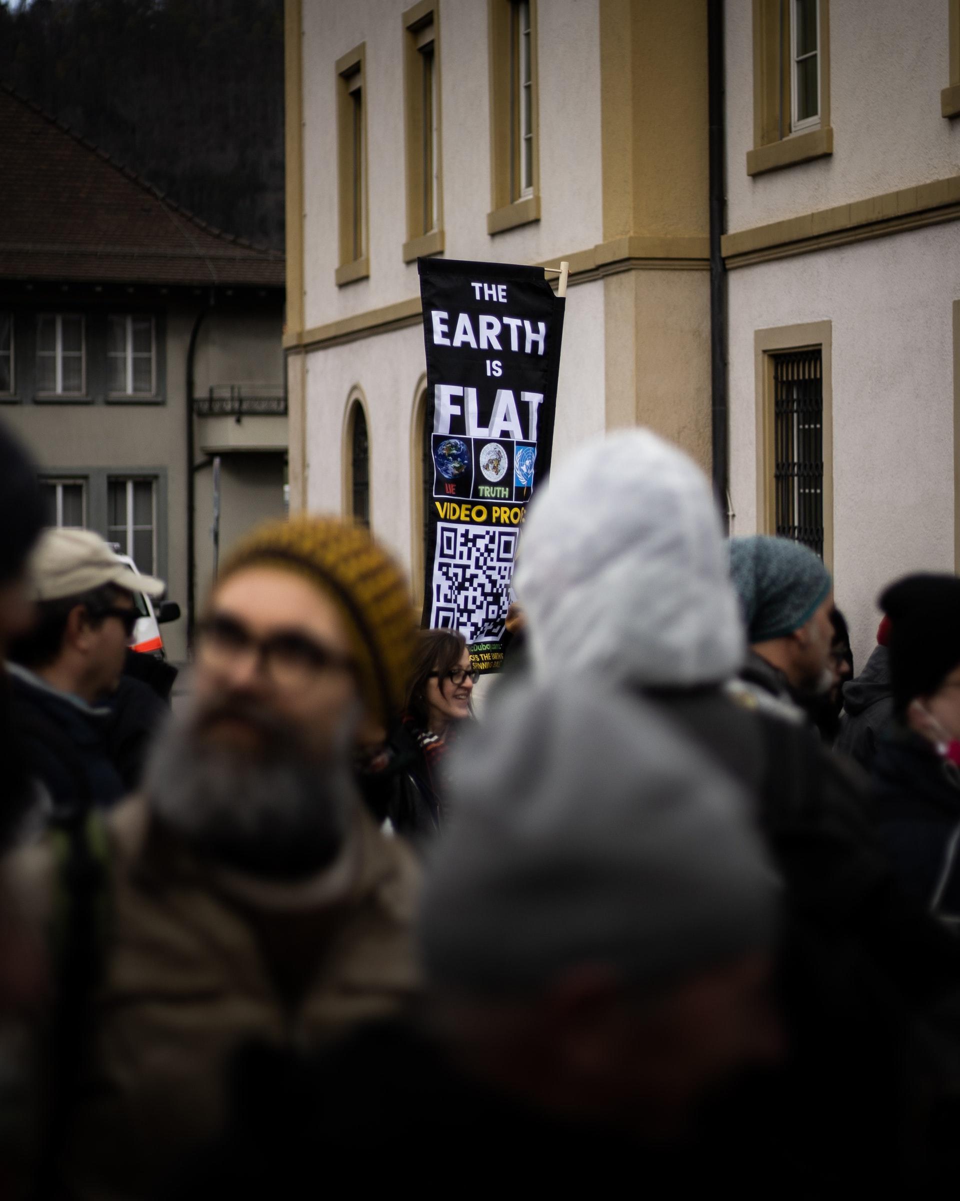 Plakat, demonstrasjon for flat earth