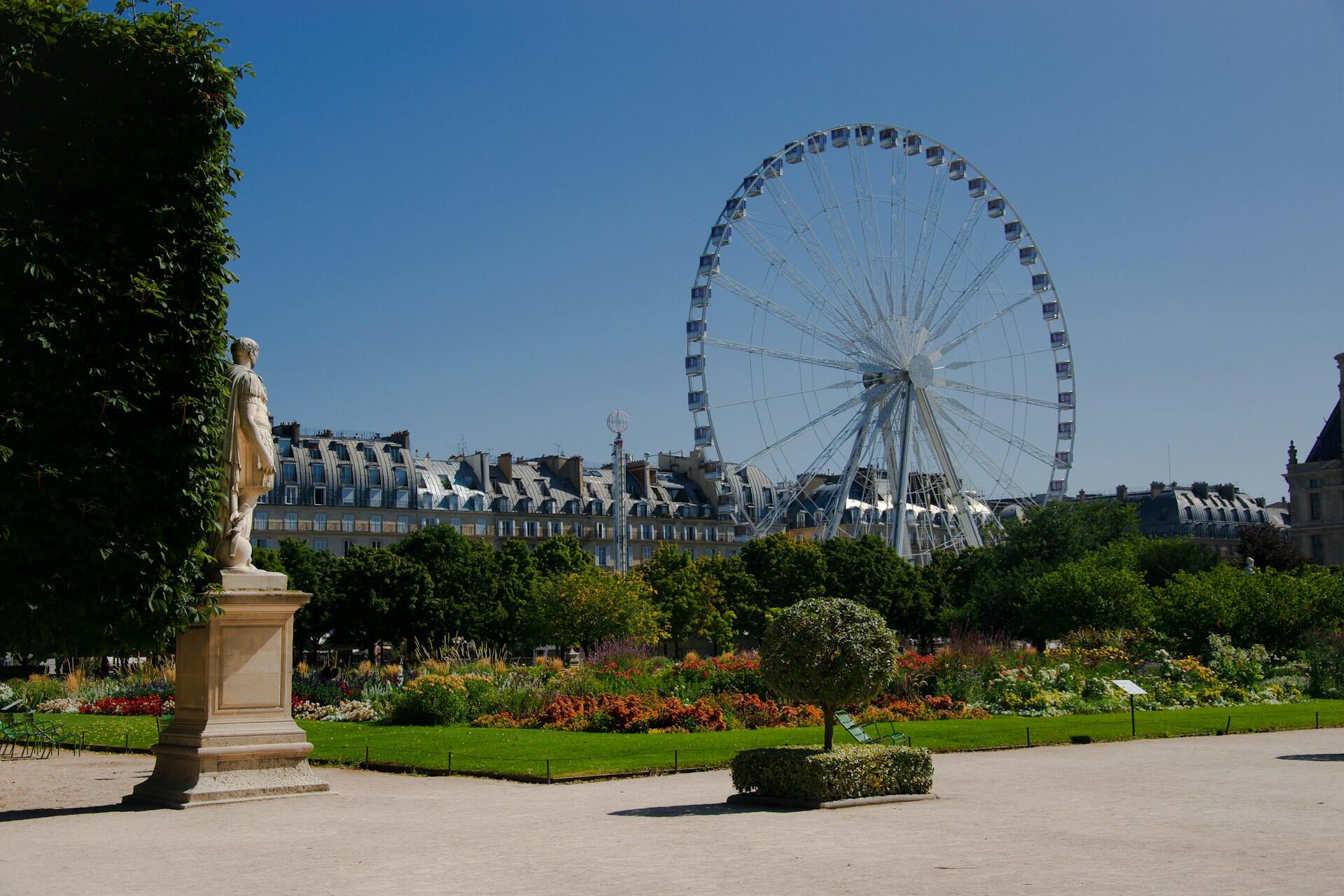 Pariserhjul, statue og hage i Paris.