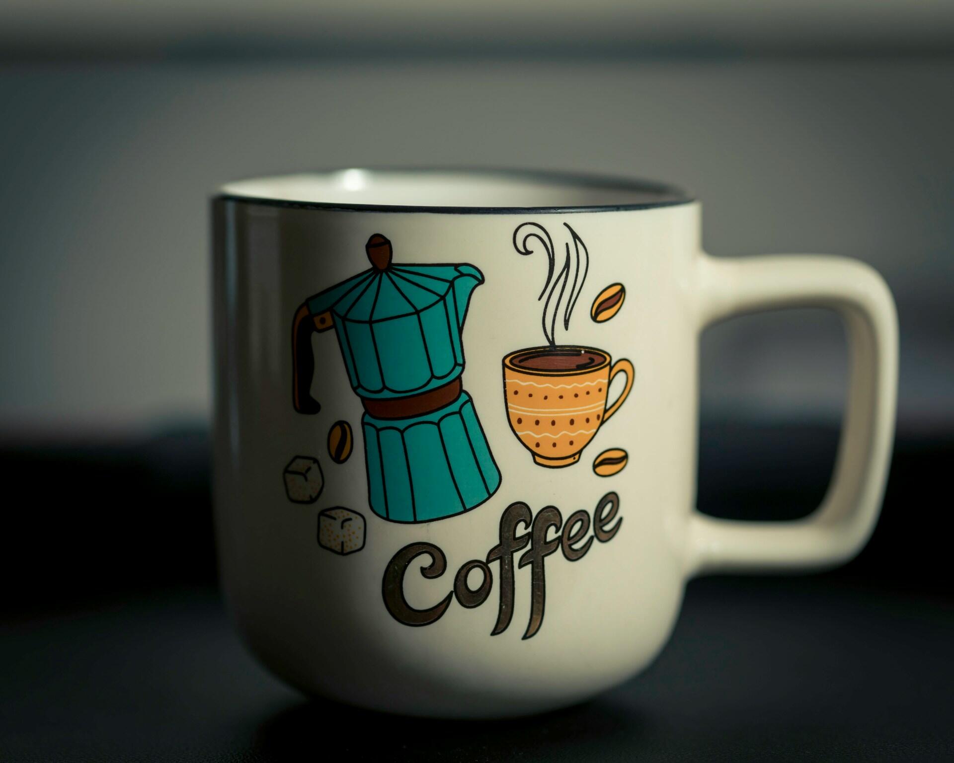 Kaffekopp med tegninger utenpå