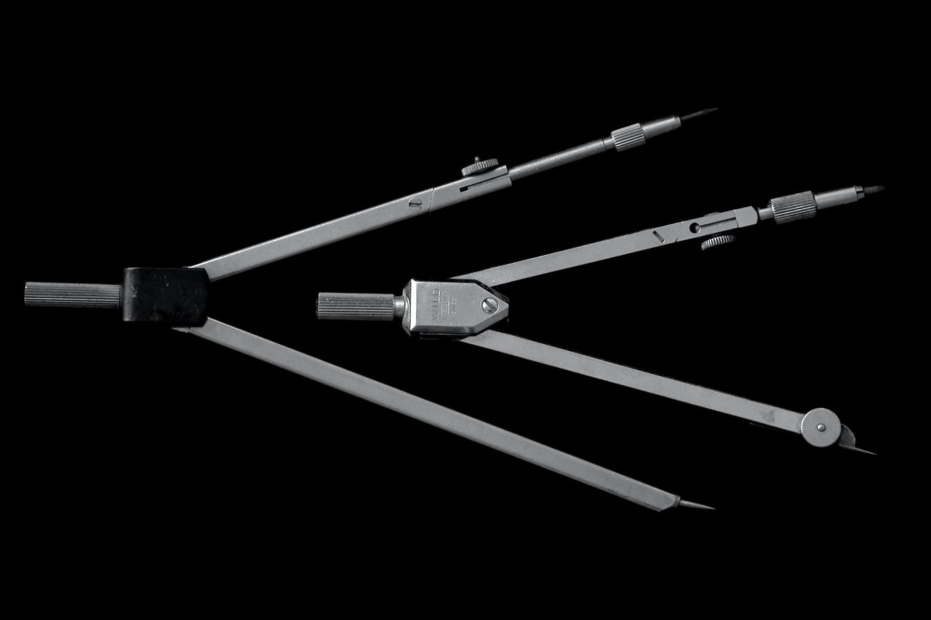 Two pairs of compasses