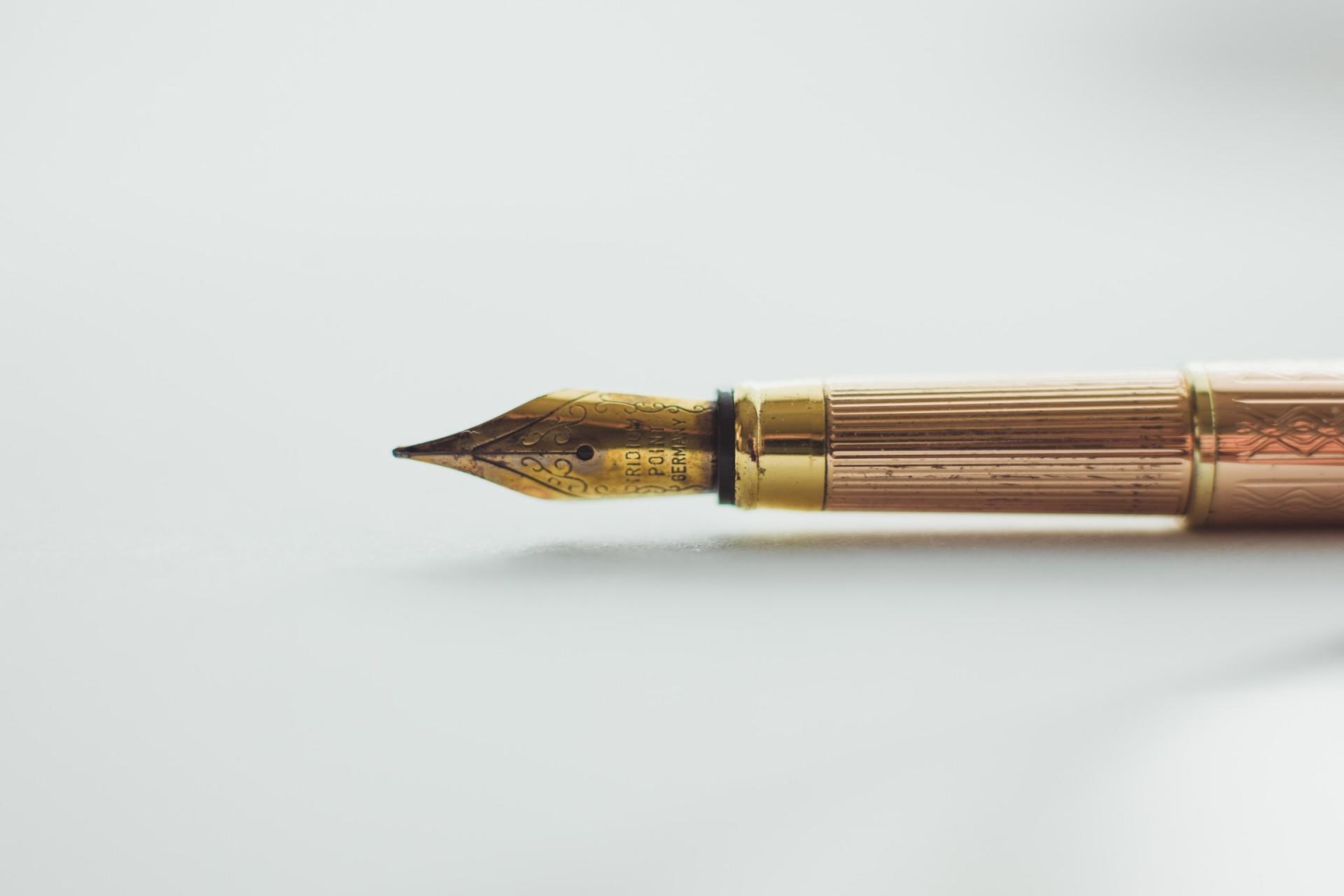 A beautiful fountain pen on a white surface