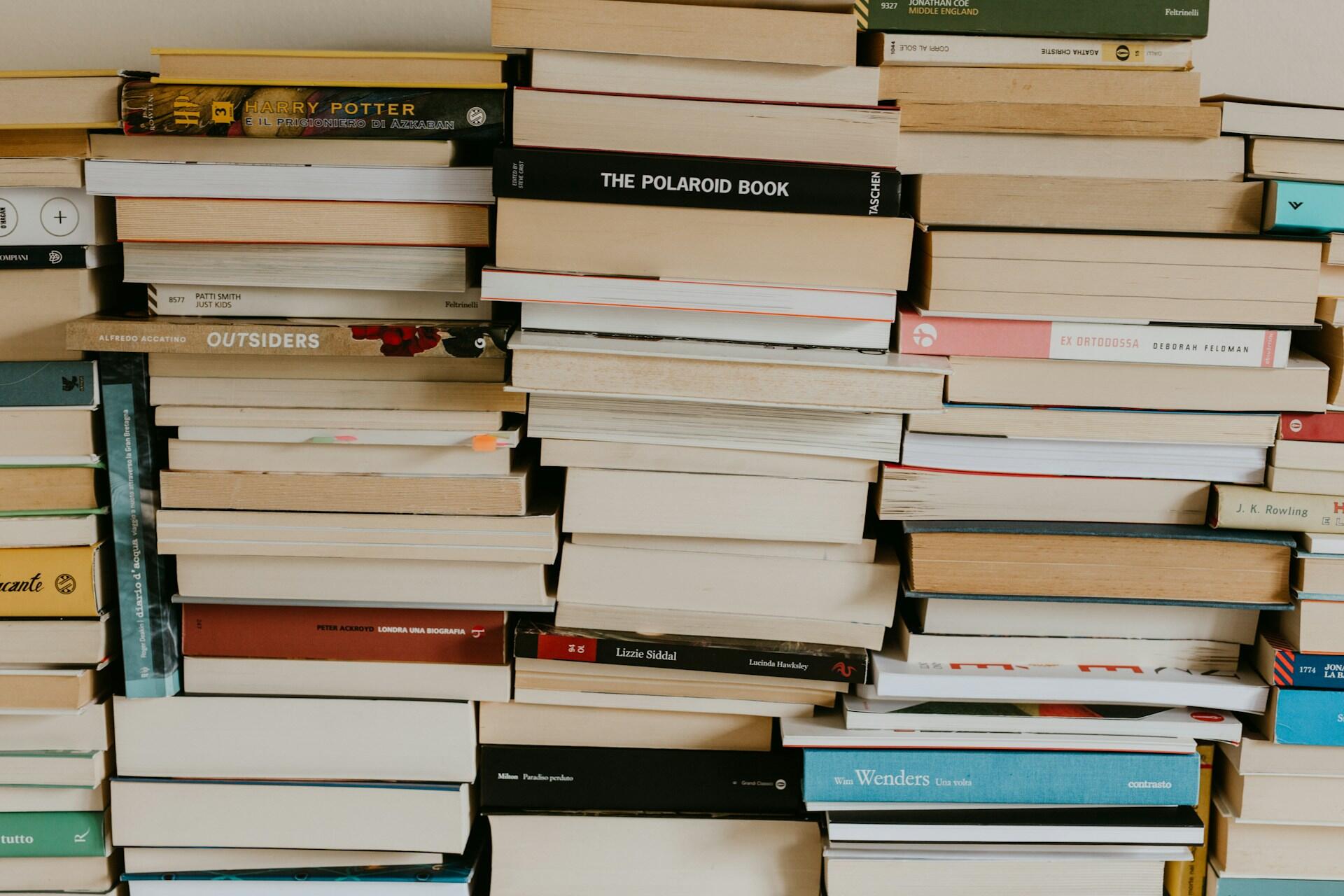 Large stacks of books arranged in rows
