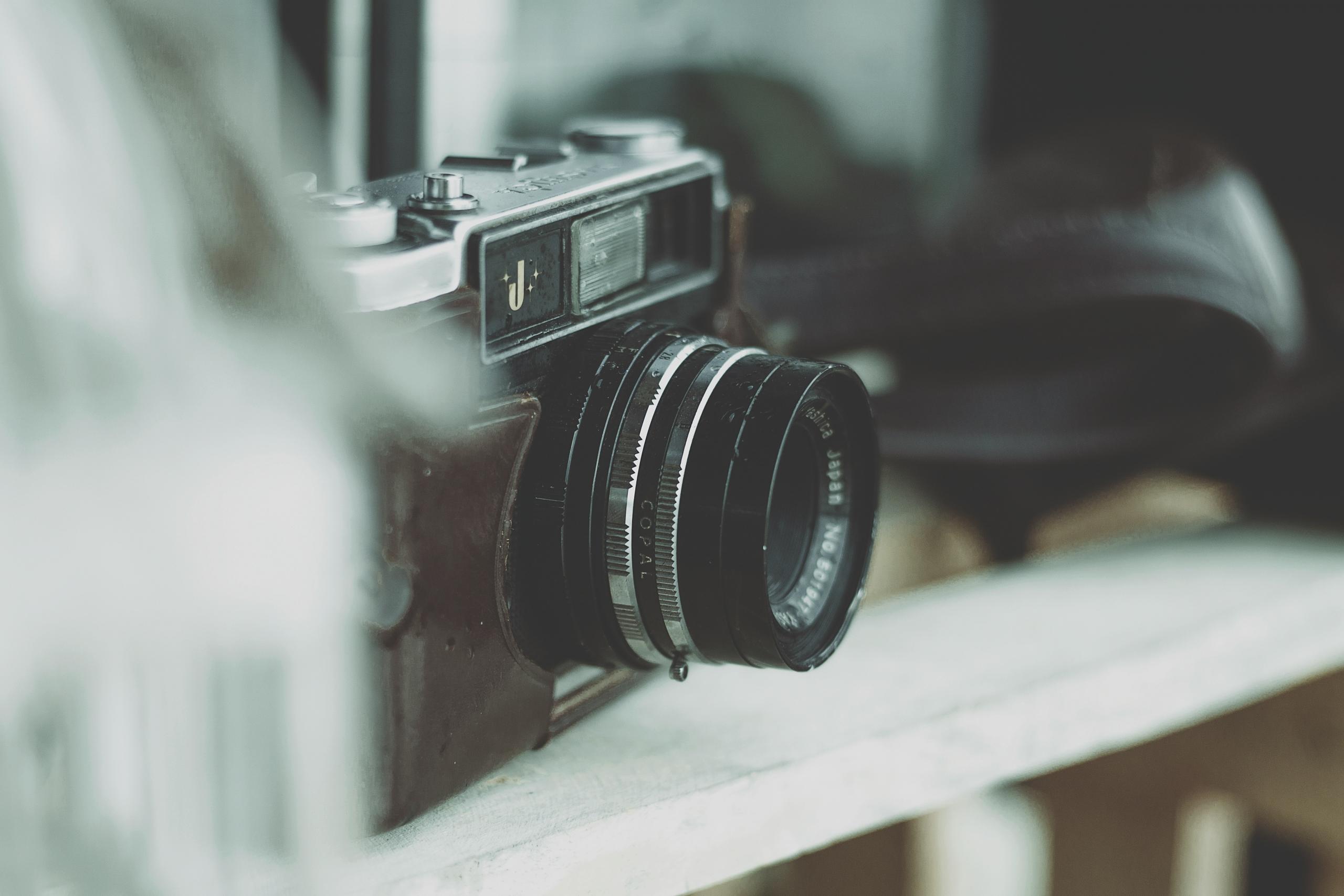 Old camera on shelf
