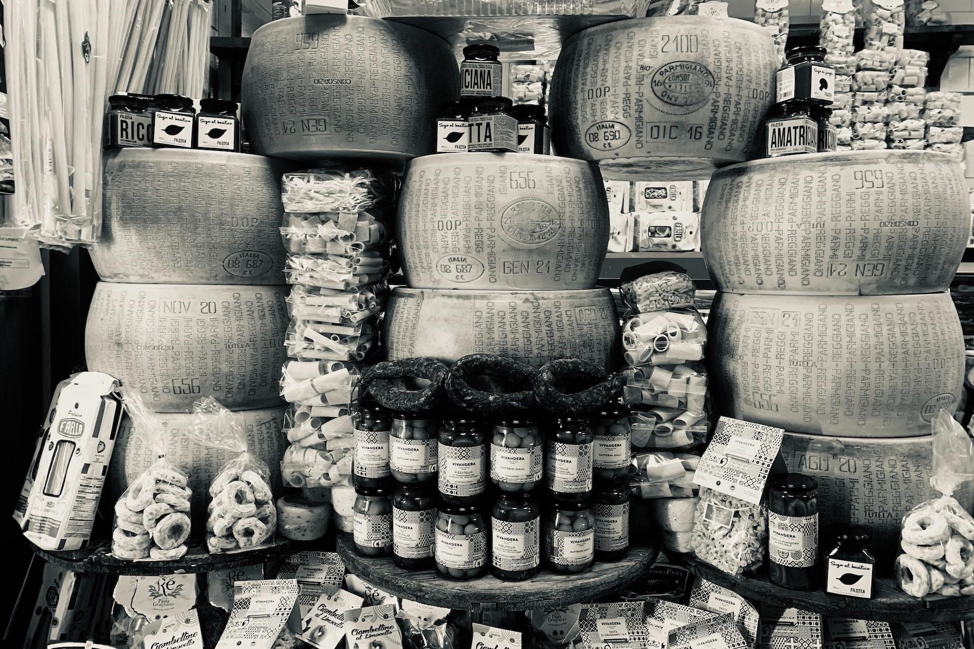 Piles of parmigiano reggiano cheese.
