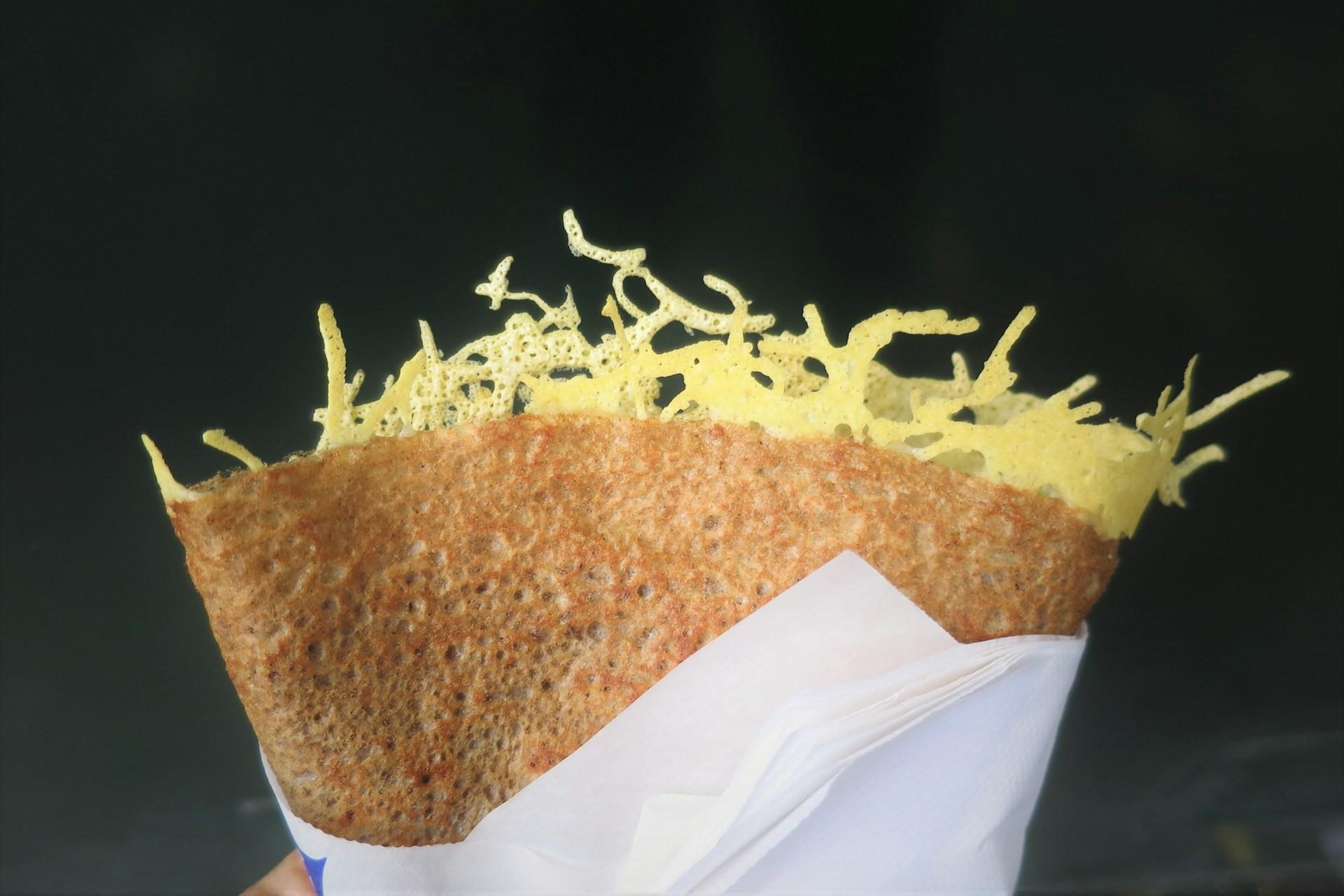 A crepe filled with cheese.