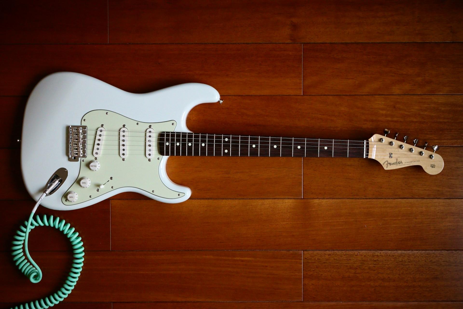 A white Fender Stratocaster.