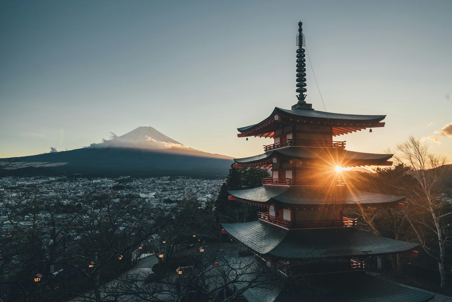 A view of Mount Fuji and a temple.
