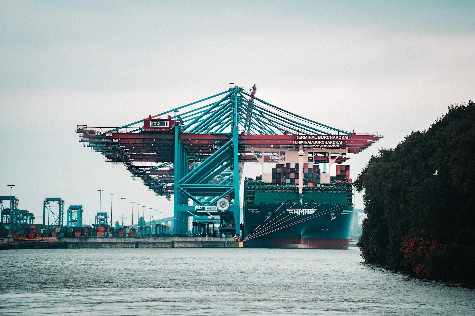 A cargo ship at a port.