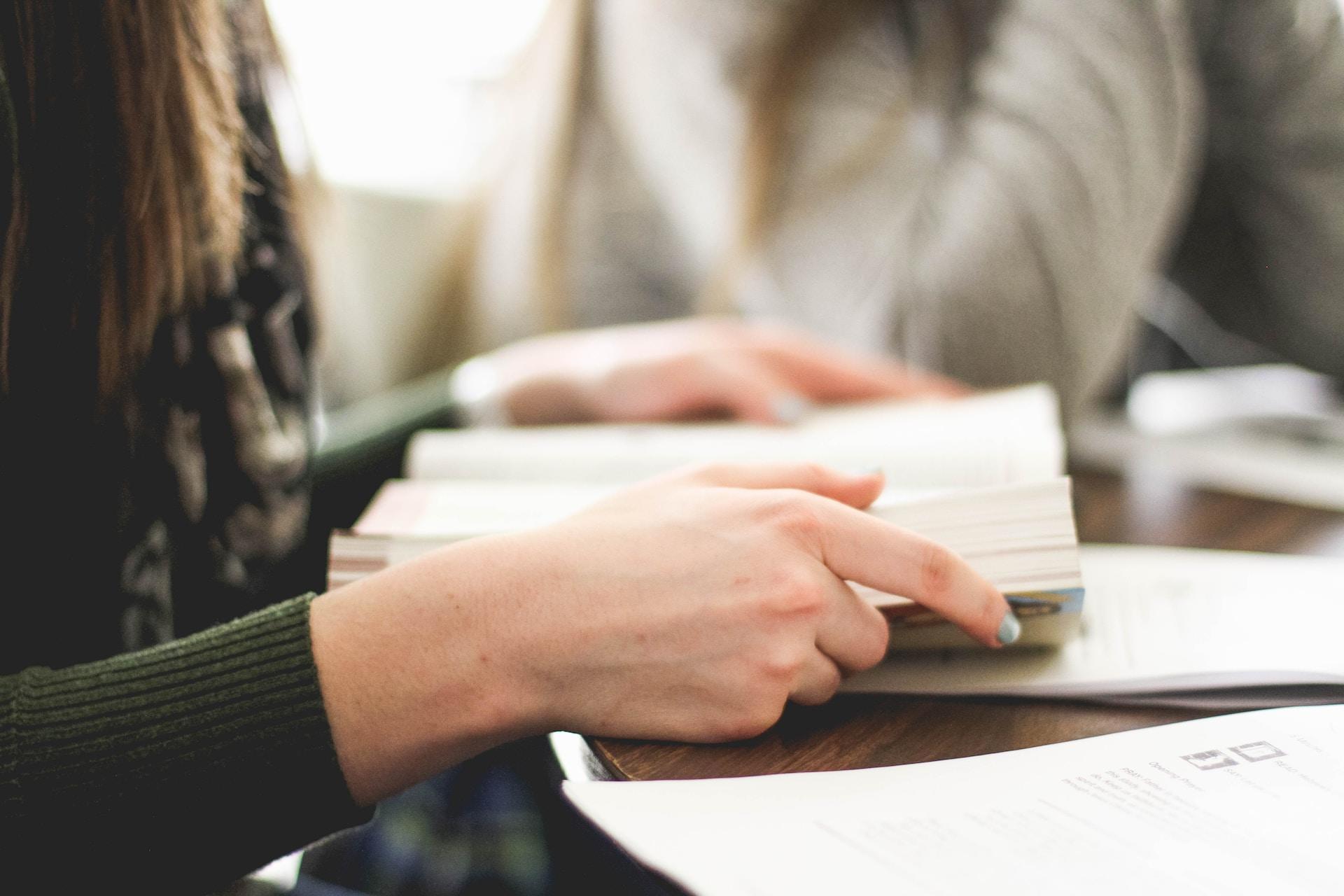 A woman reading a book.