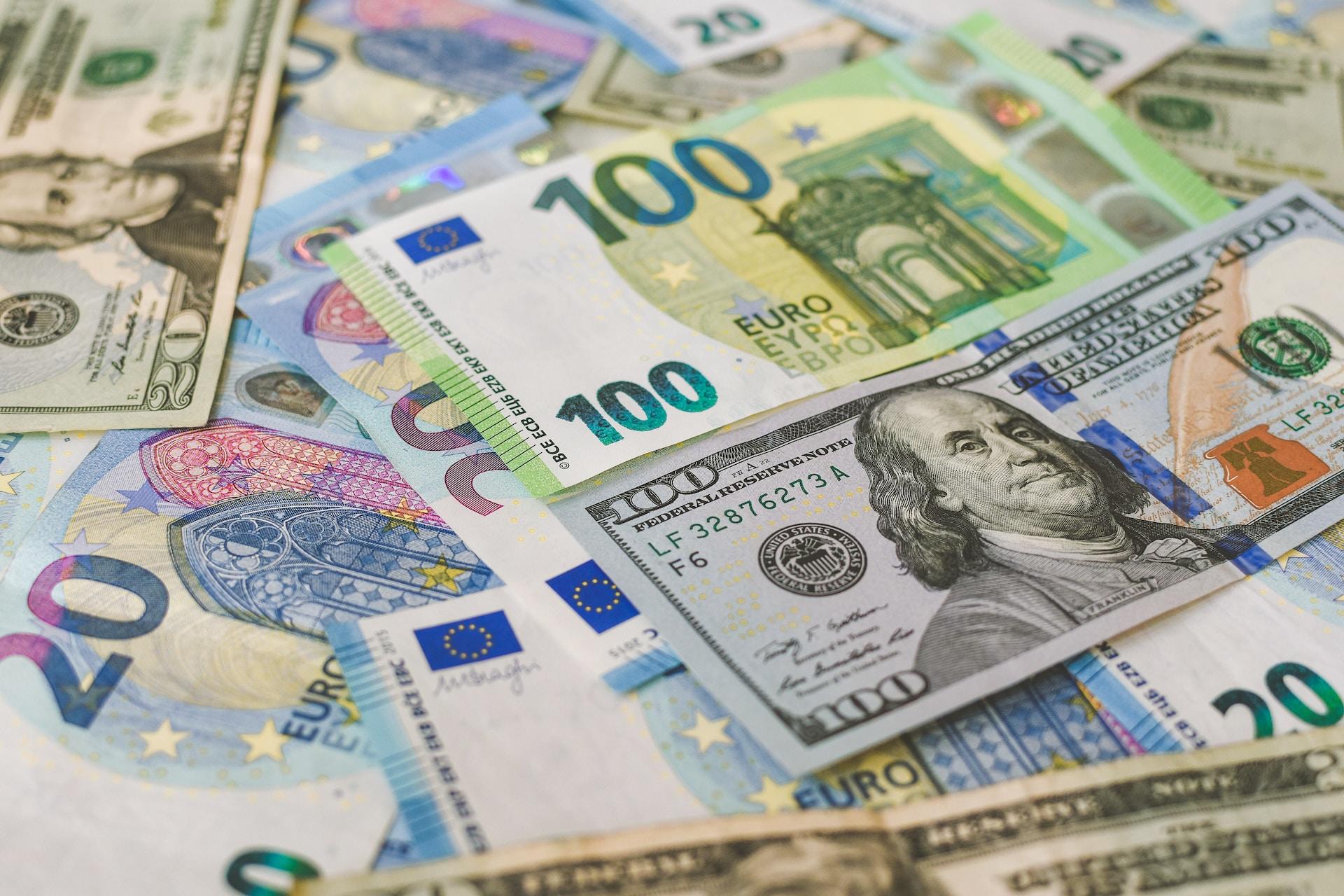 A pile of banknotes from around the world.
