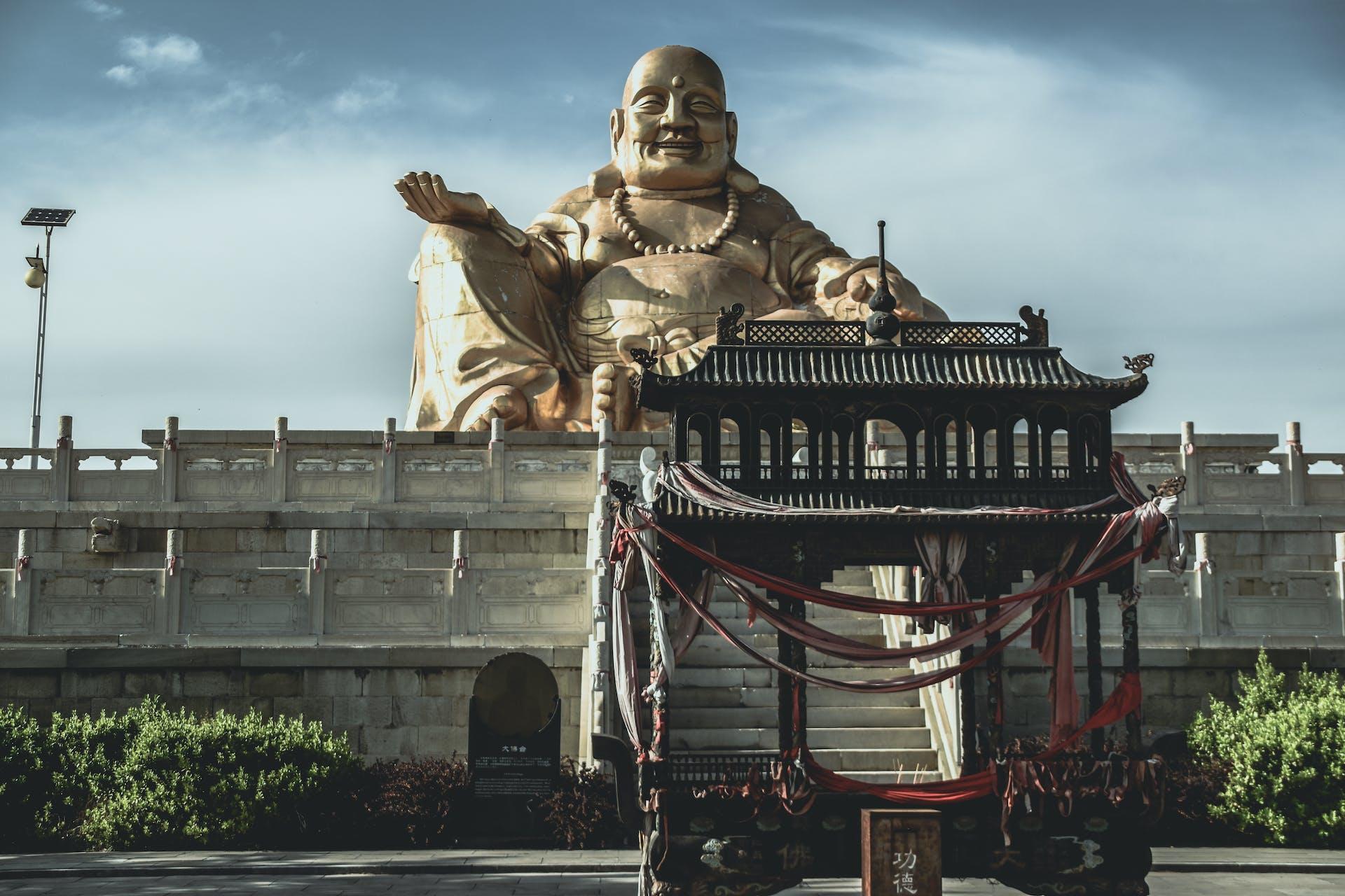 A large statue of Buddha in a Chinese temple